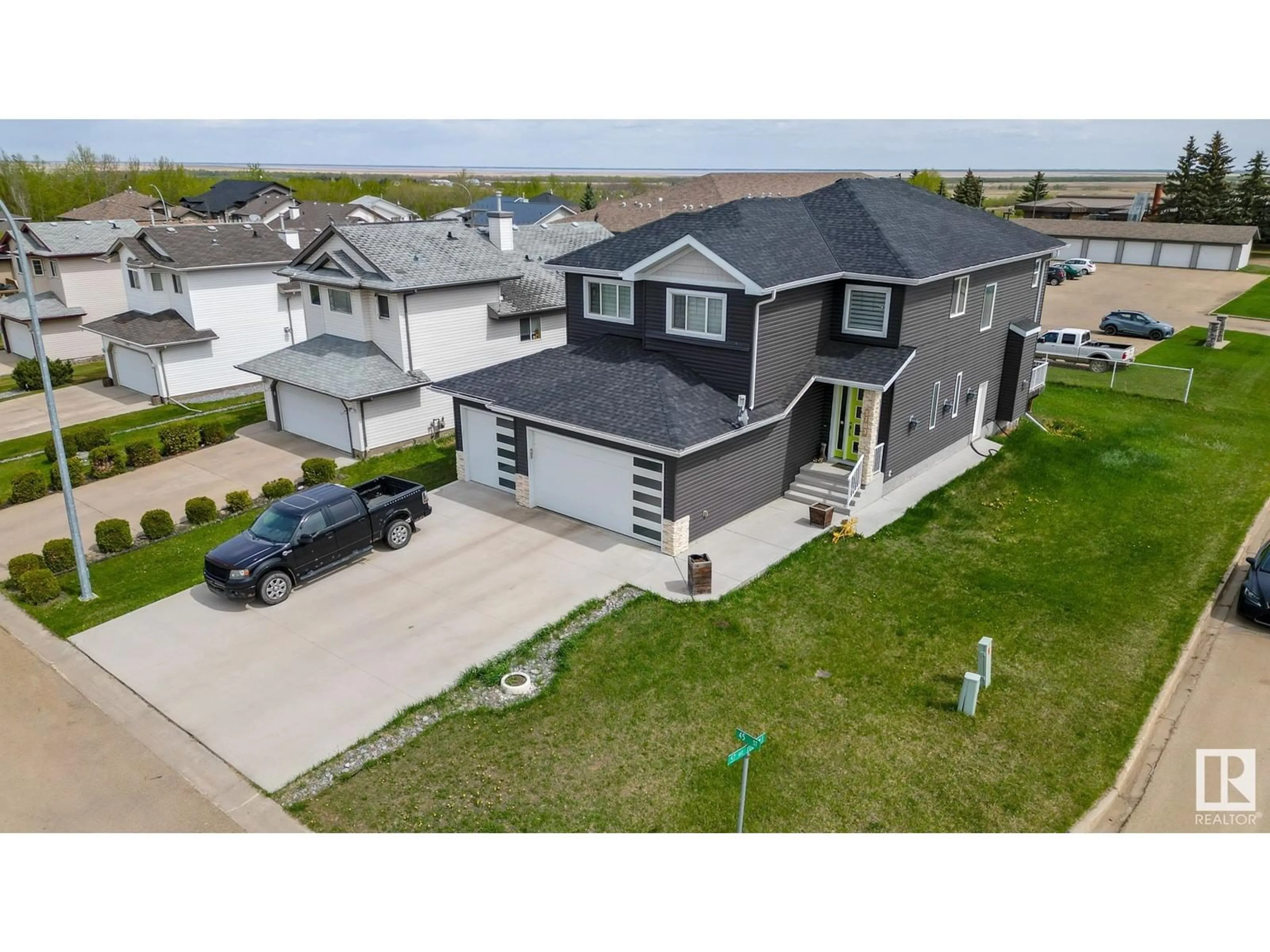 A pic from outside/outdoor area/front of a property/back of a property/a pic from drone, street for 5703 45 ST, Tofield Alberta T4V4Y2