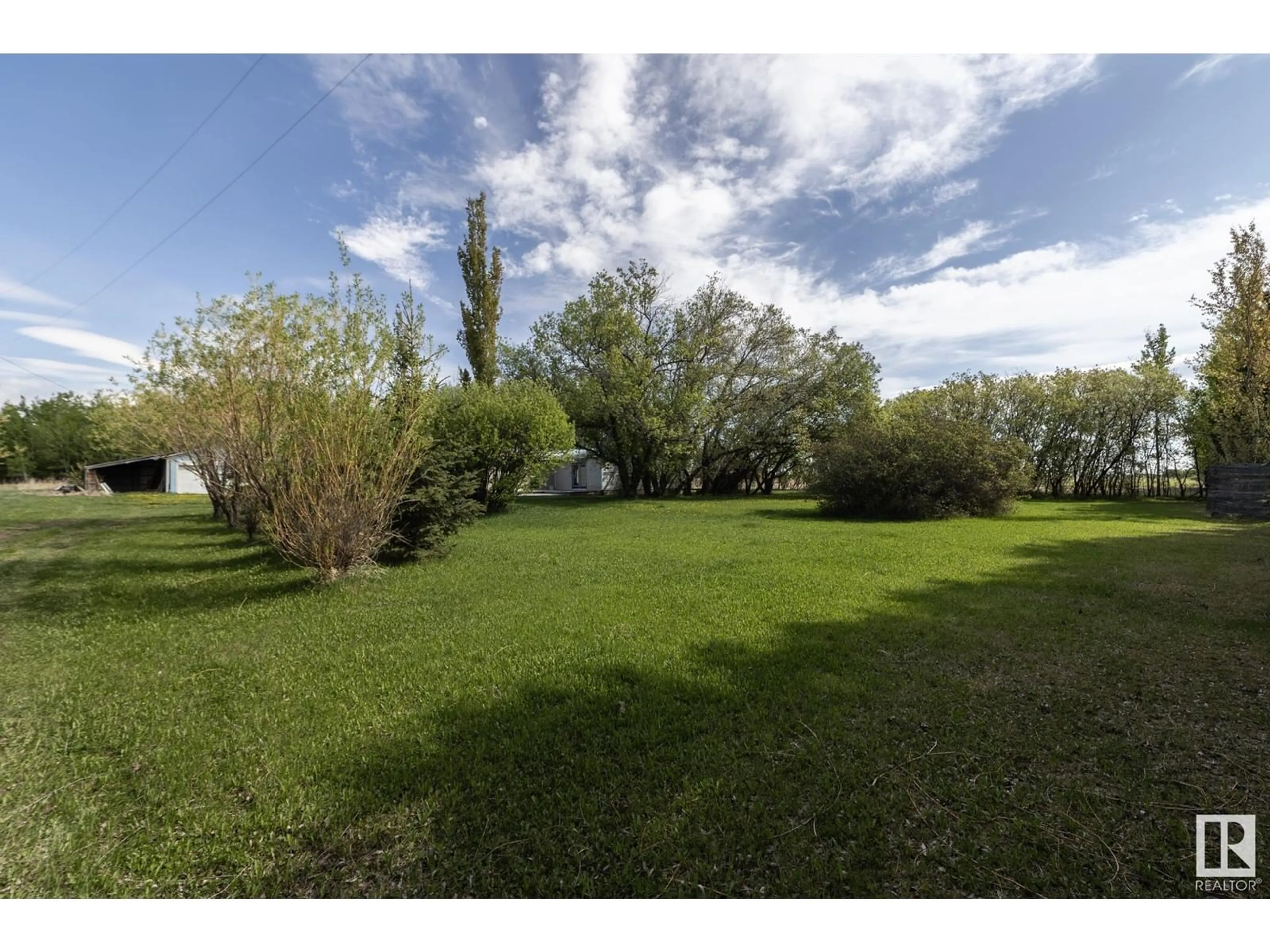 A pic from outside/outdoor area/front of a property/back of a property/a pic from drone, water/lake/river/ocean view for 7018 TOWNSHIP 600, Rural Barrhead County Alberta T0E2A0