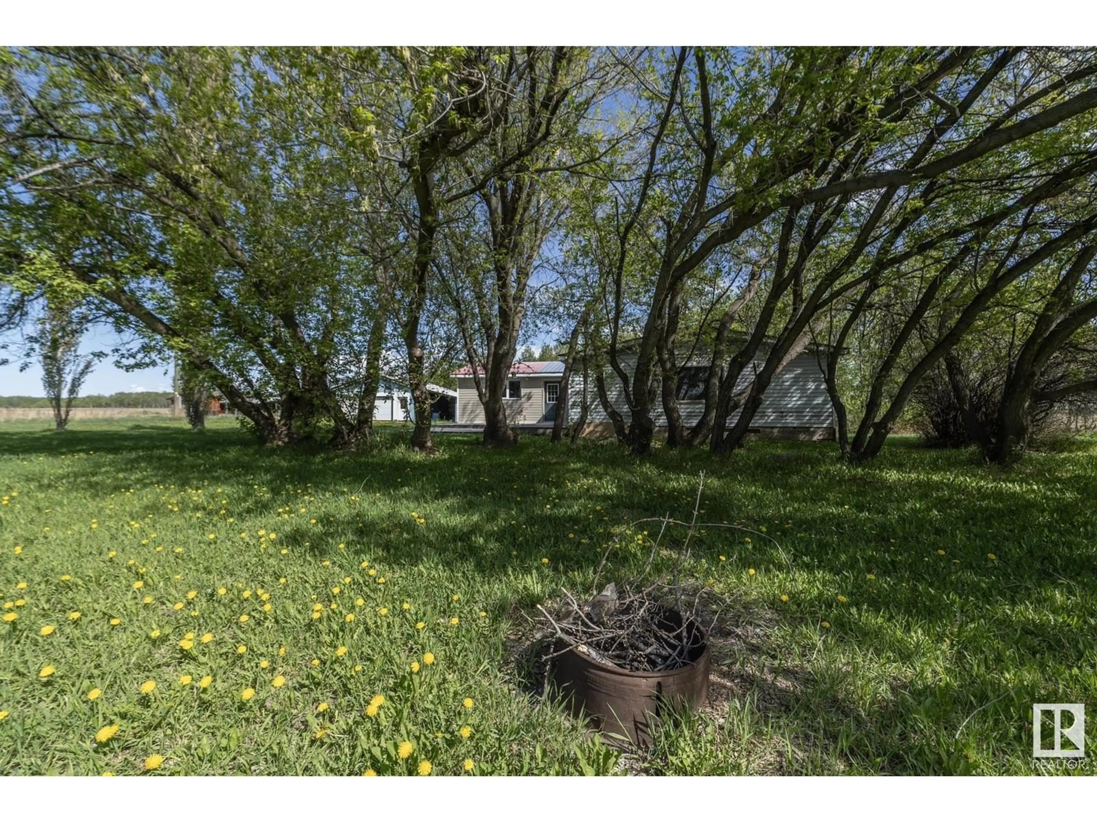 A pic from outside/outdoor area/front of a property/back of a property/a pic from drone, forest/trees view for 7018 TOWNSHIP 600, Rural Barrhead County Alberta T0E2A0