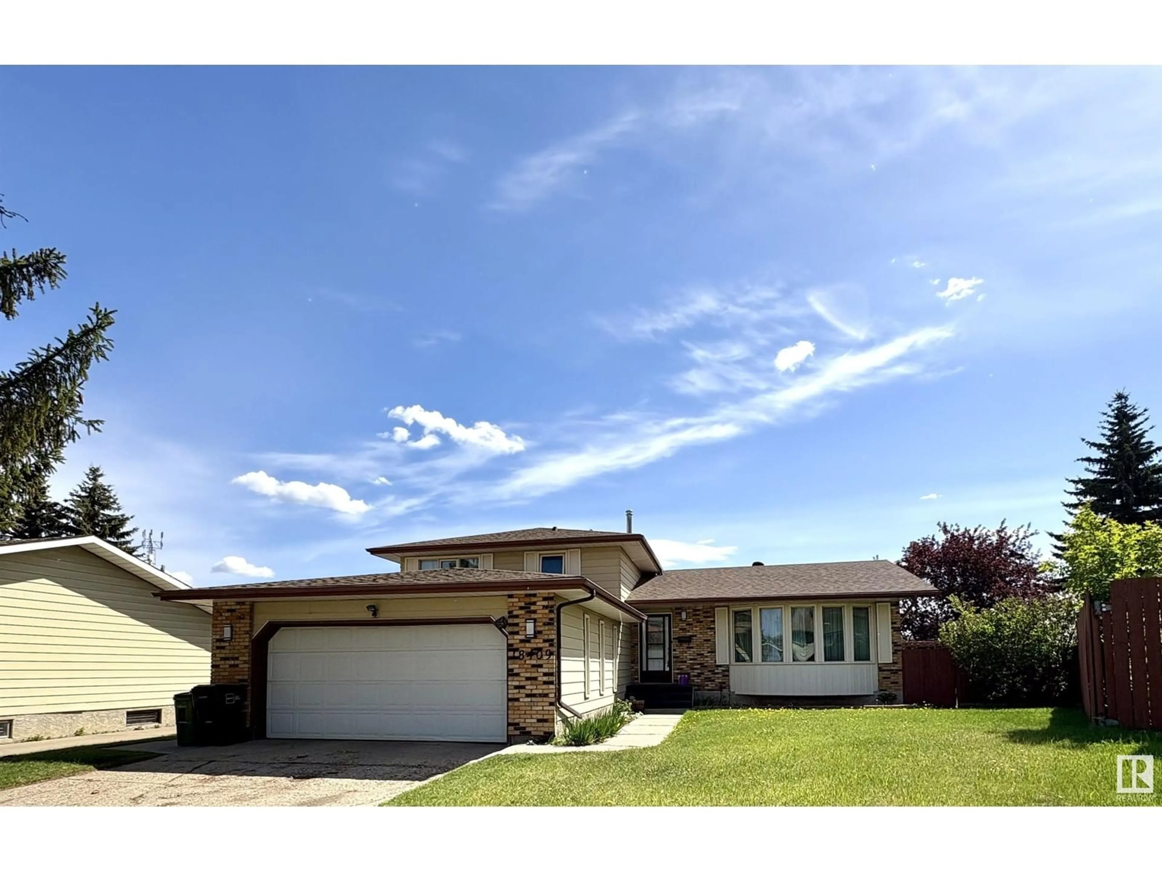 Home with vinyl exterior material, street for NW - 18409 62B AV, Edmonton Alberta T5T2S9
