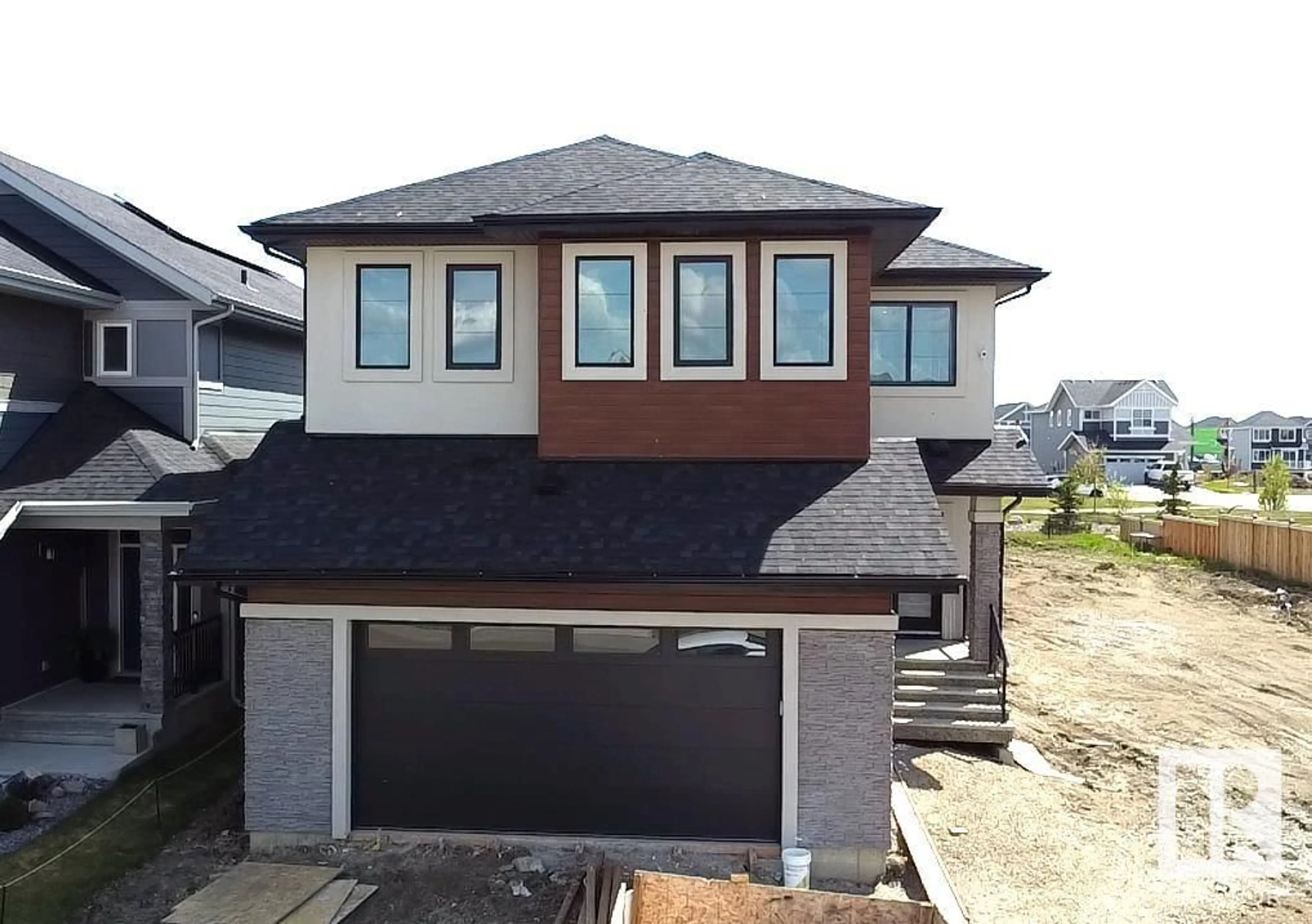 Home with vinyl exterior material, street for 165 EDGEWATER CIR, Leduc Alberta T9E1K5