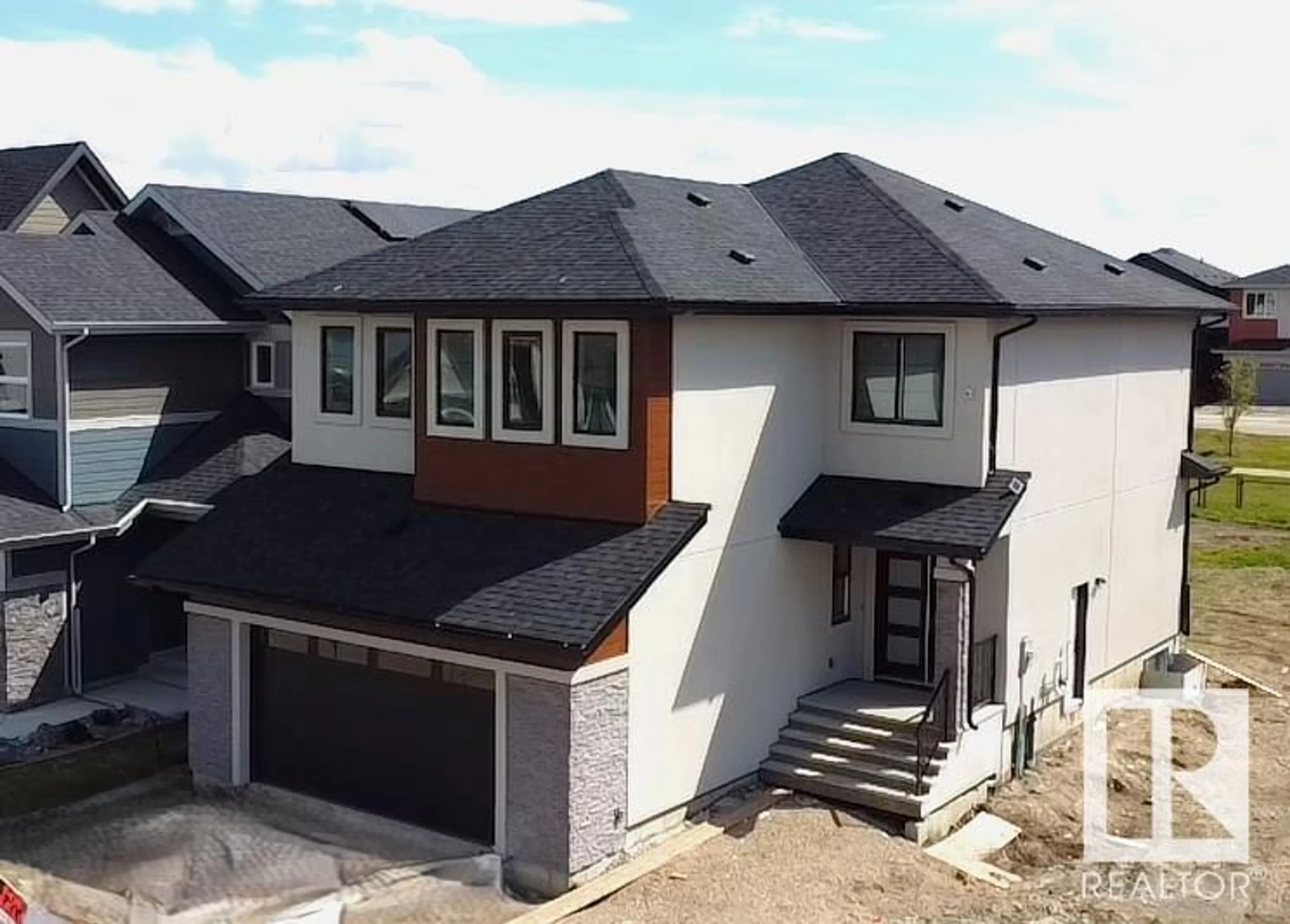 A pic from outside/outdoor area/front of a property/back of a property/a pic from drone, building for 165 EDGEWATER CIR, Leduc Alberta T9E1K5
