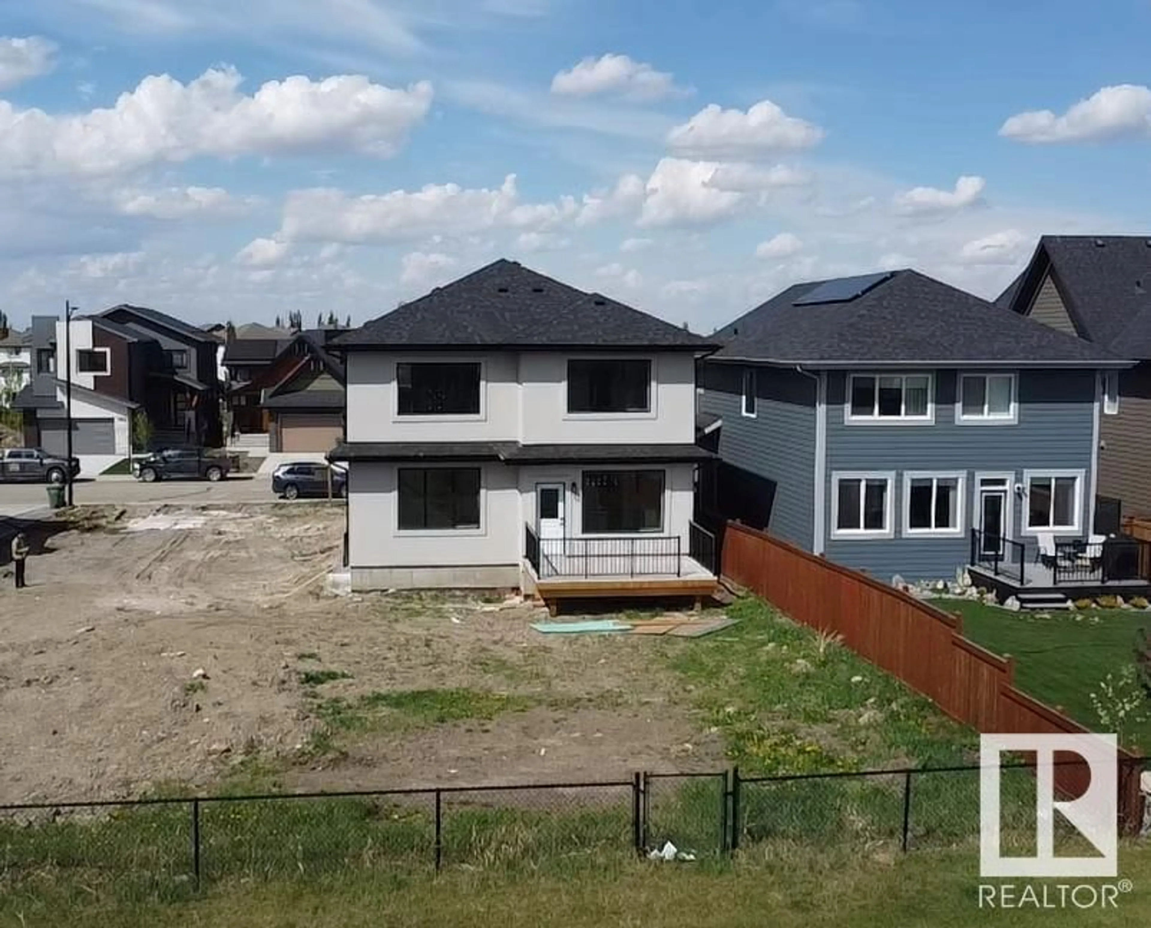 A pic from outside/outdoor area/front of a property/back of a property/a pic from drone, building for 165 EDGEWATER CIR, Leduc Alberta T9E1K5