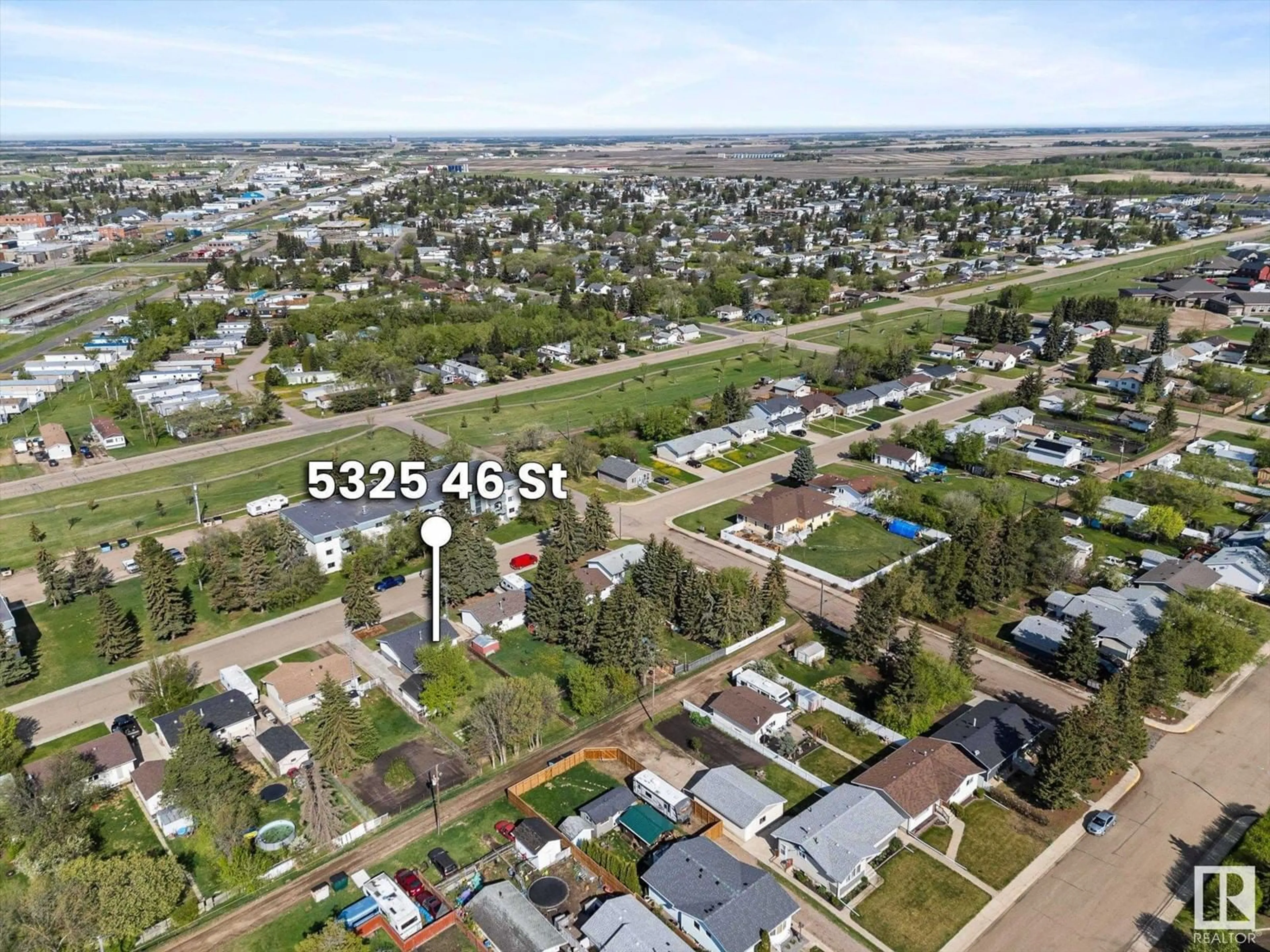 A pic from outside/outdoor area/front of a property/back of a property/a pic from drone, street for 5325 46 ST, Vegreville Alberta T9C1C4
