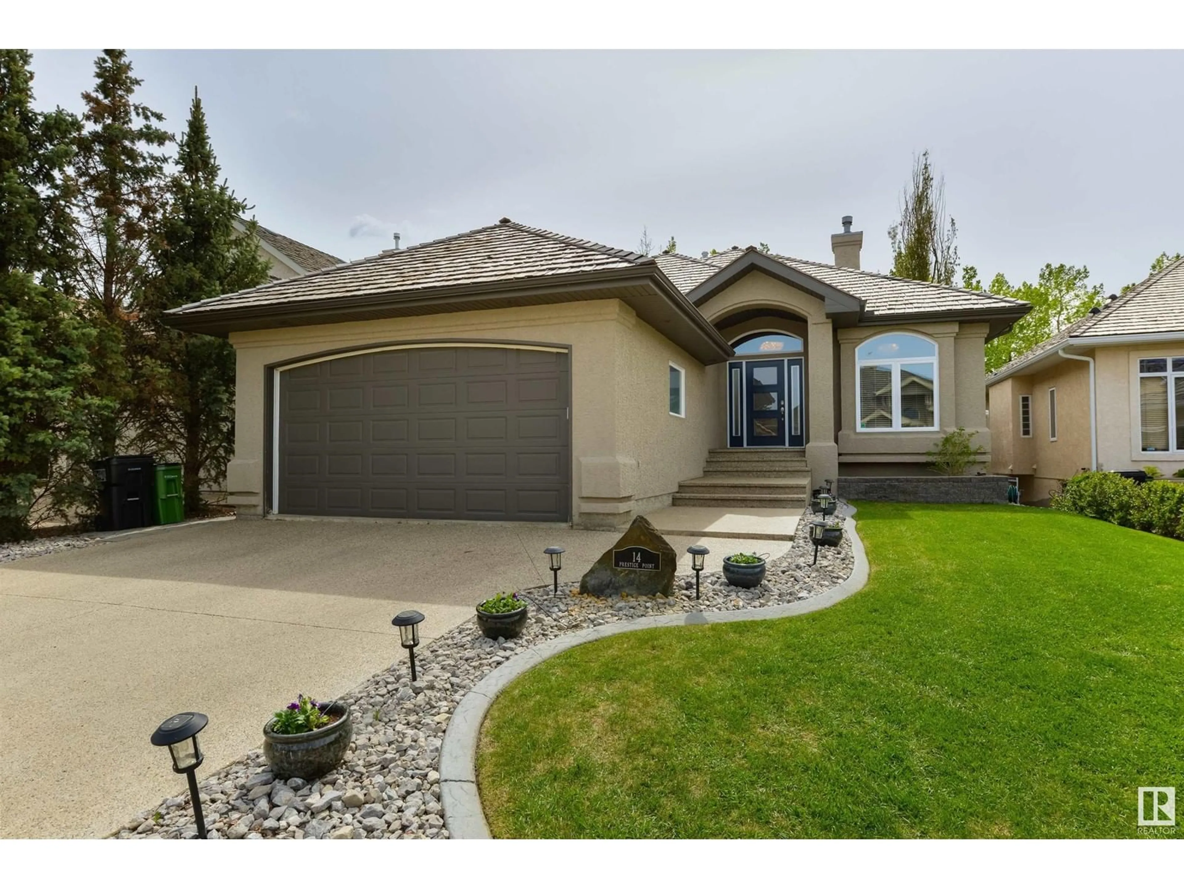 Home with vinyl exterior material, street for 14 PRESTIGE NW, Edmonton Alberta T6M2T3