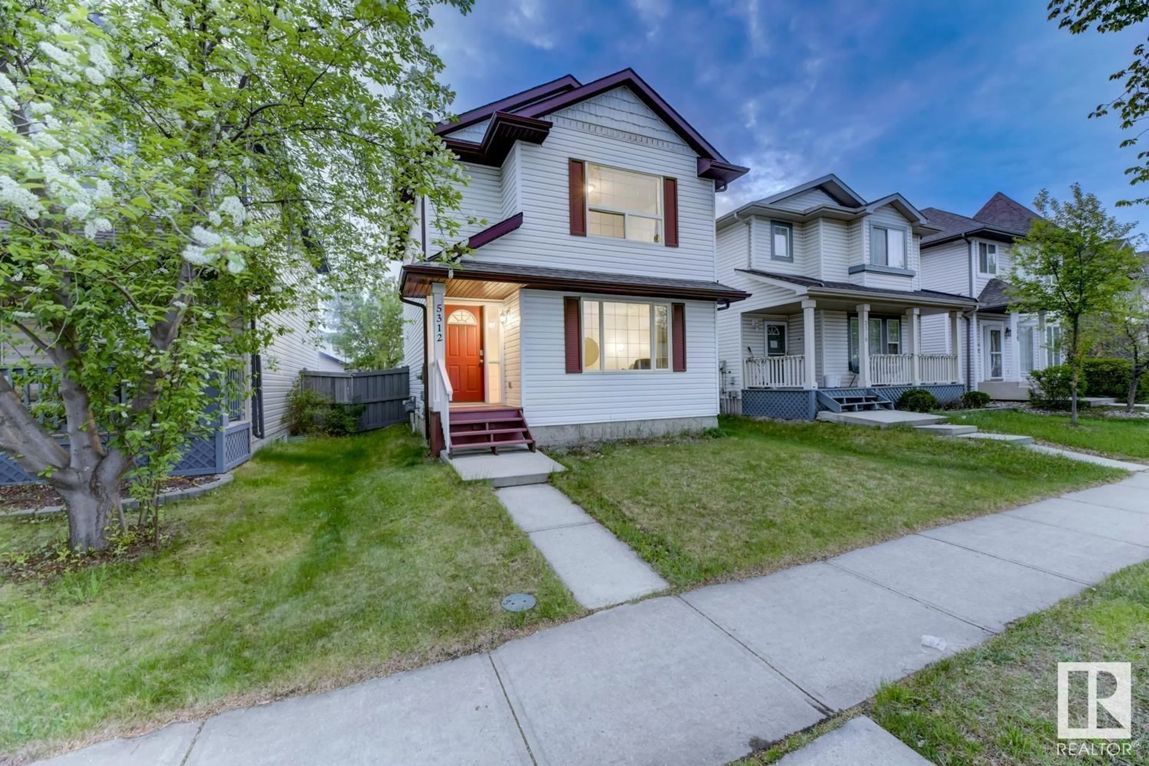 Home with vinyl exterior material, street for NW - 5312 201 ST, Edmonton Alberta T6M2W2
