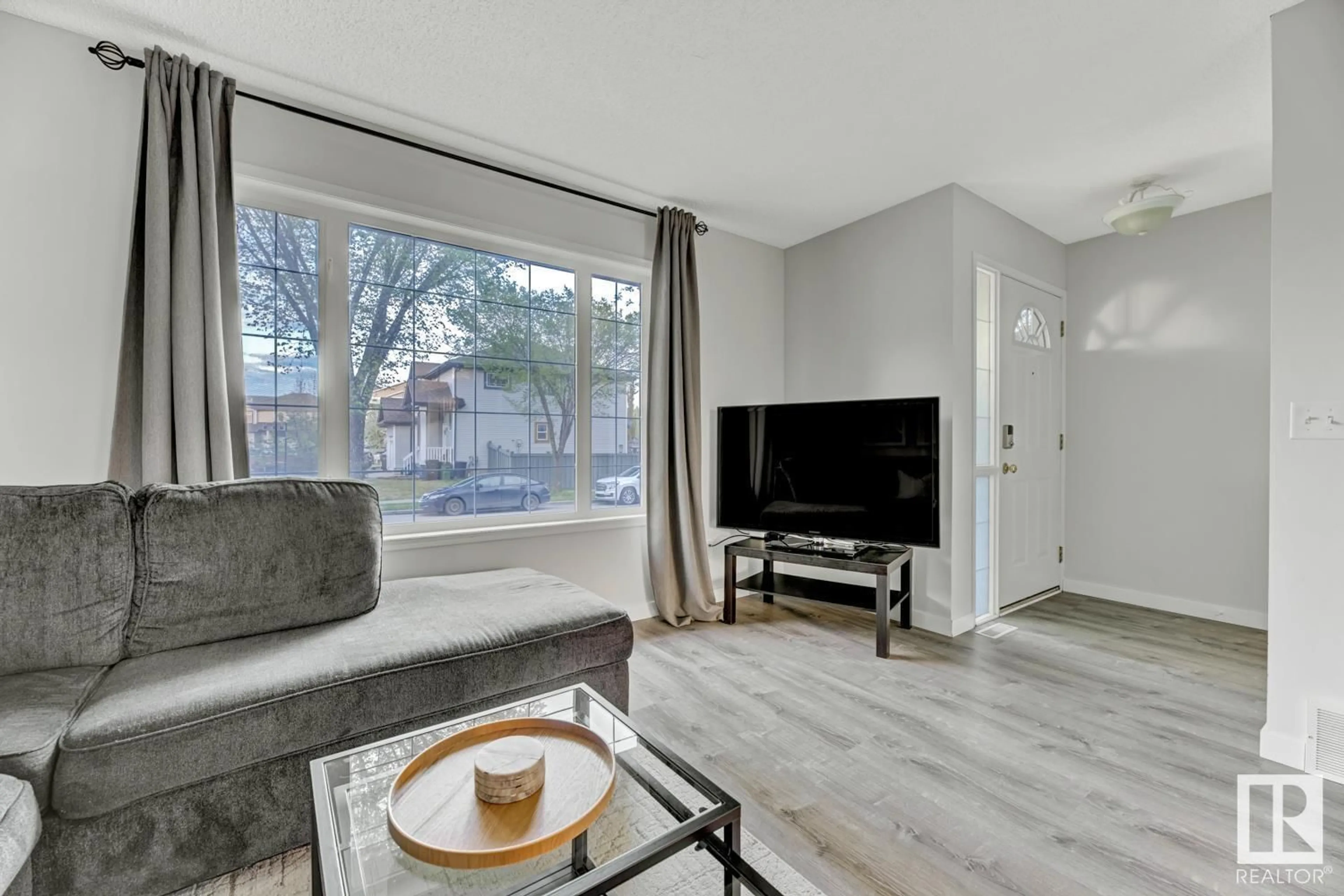 Living room with furniture, unknown for NW - 5312 201 ST, Edmonton Alberta T6M2W2