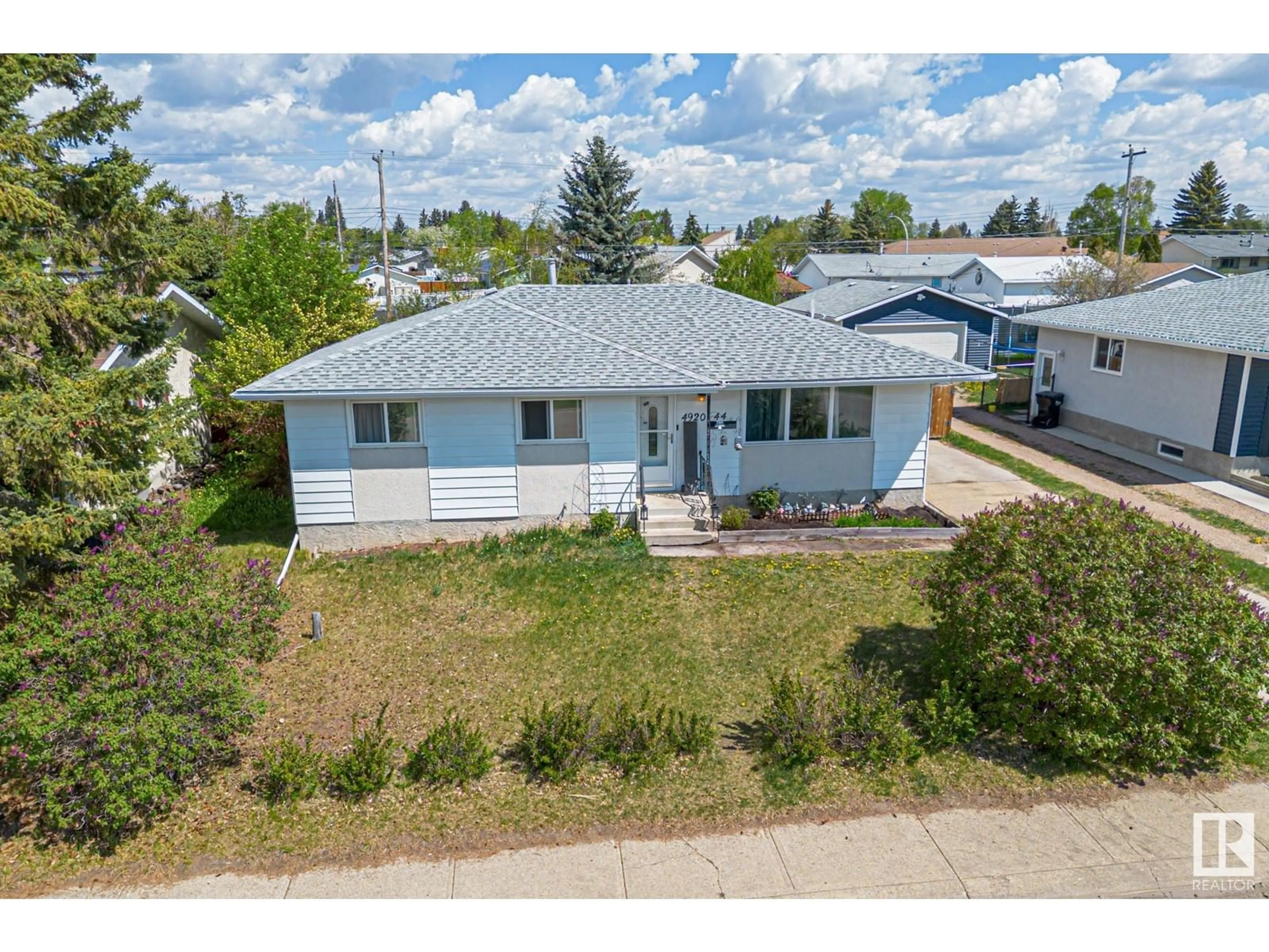 A pic from outside/outdoor area/front of a property/back of a property/a pic from drone, street for 4920 44 AV, Gibbons Alberta T0A1N0