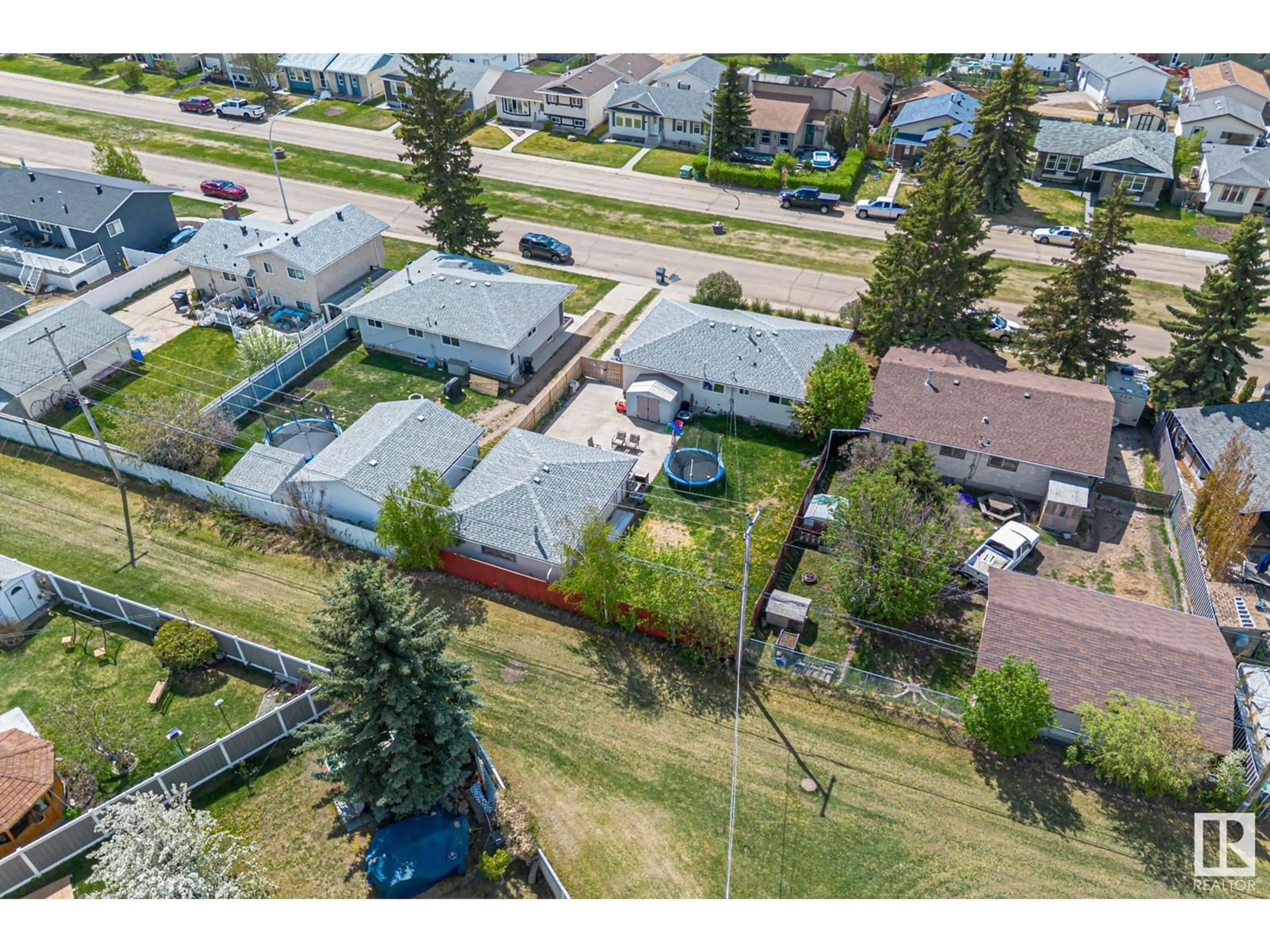 A pic from outside/outdoor area/front of a property/back of a property/a pic from drone, street for 4920 44 AV, Gibbons Alberta T0A1N0