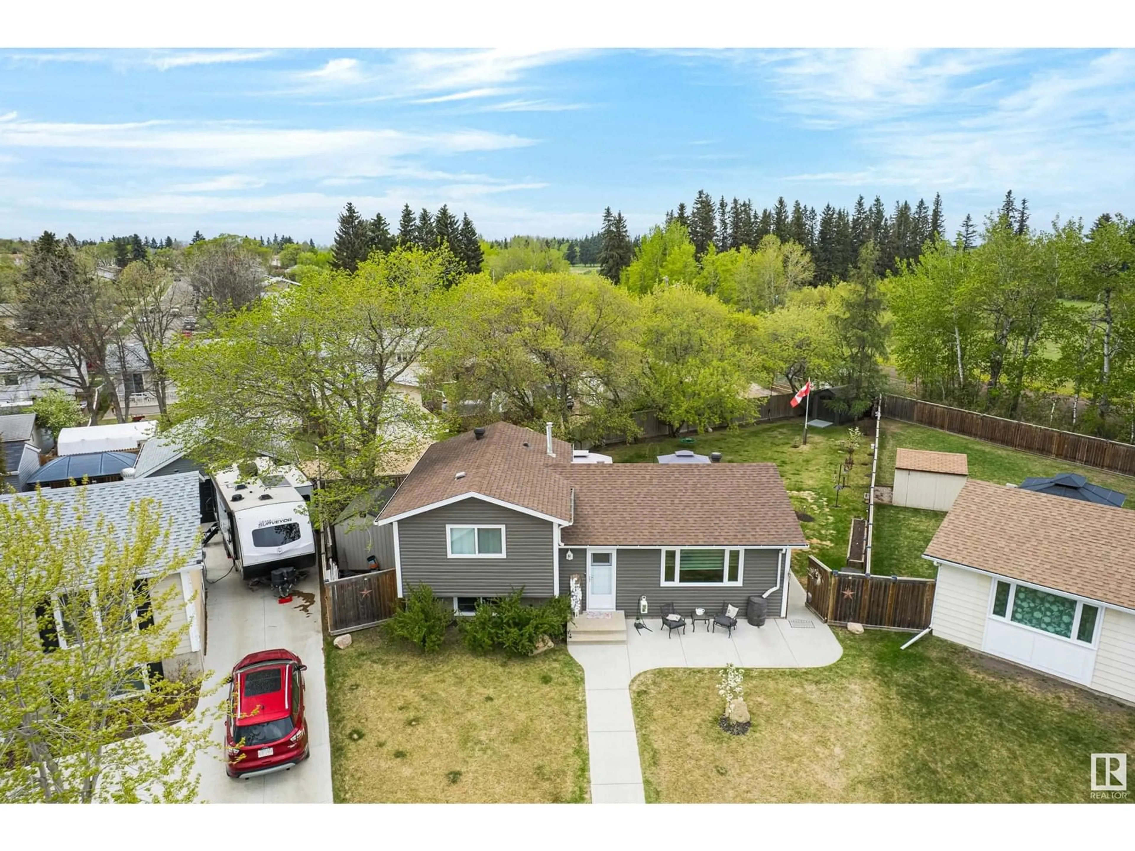 A pic from outside/outdoor area/front of a property/back of a property/a pic from drone, street for 5234 46 ST, Bon Accord Alberta T0A0K0