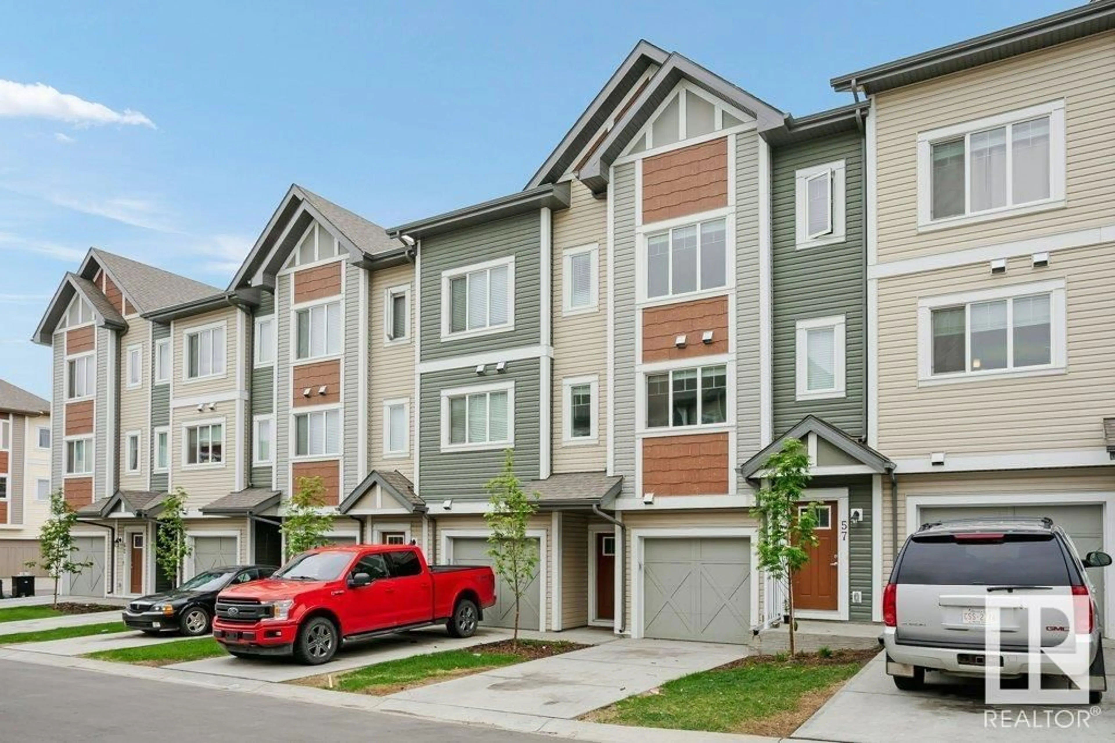 Home with vinyl exterior material, street for 320 - 58 SECORD BV, Edmonton Alberta T5T7E8
