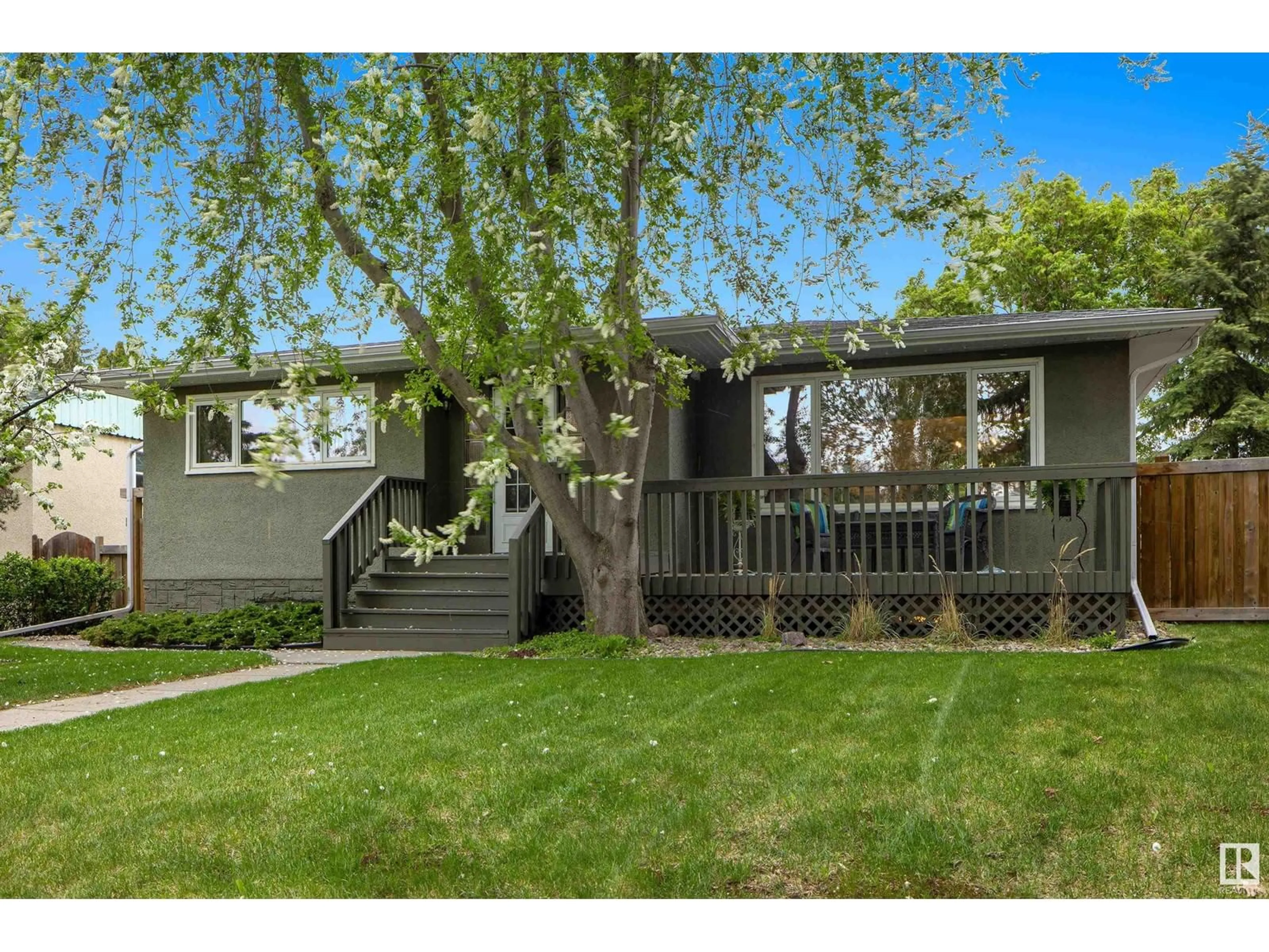 Home with vinyl exterior material, street for 8746 STRATHEARN DR, Edmonton Alberta T6C4C7