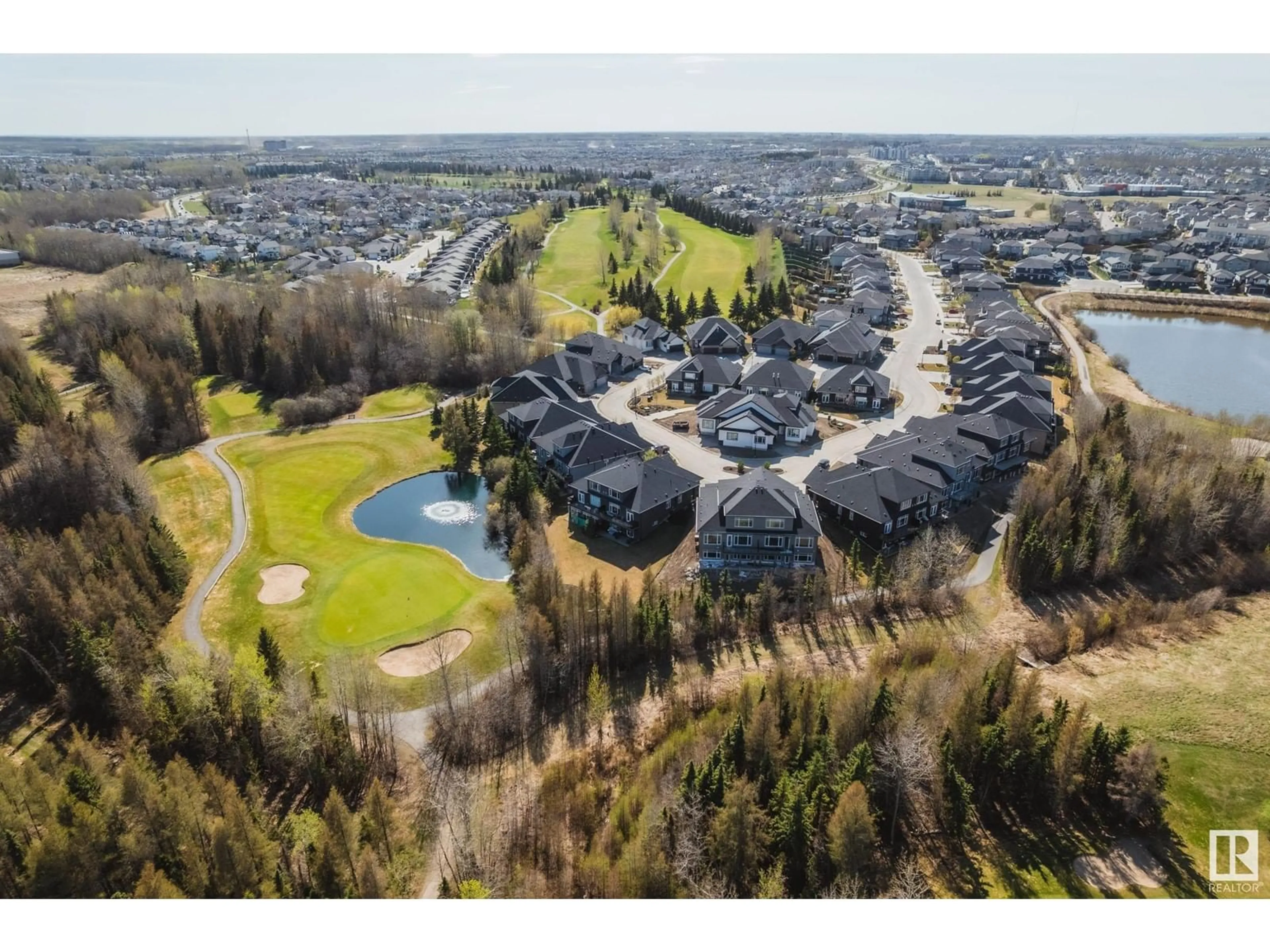 A pic from outside/outdoor area/front of a property/back of a property/a pic from drone, unknown for #9 - 20425 93 AV, Edmonton Alberta T5T7C7