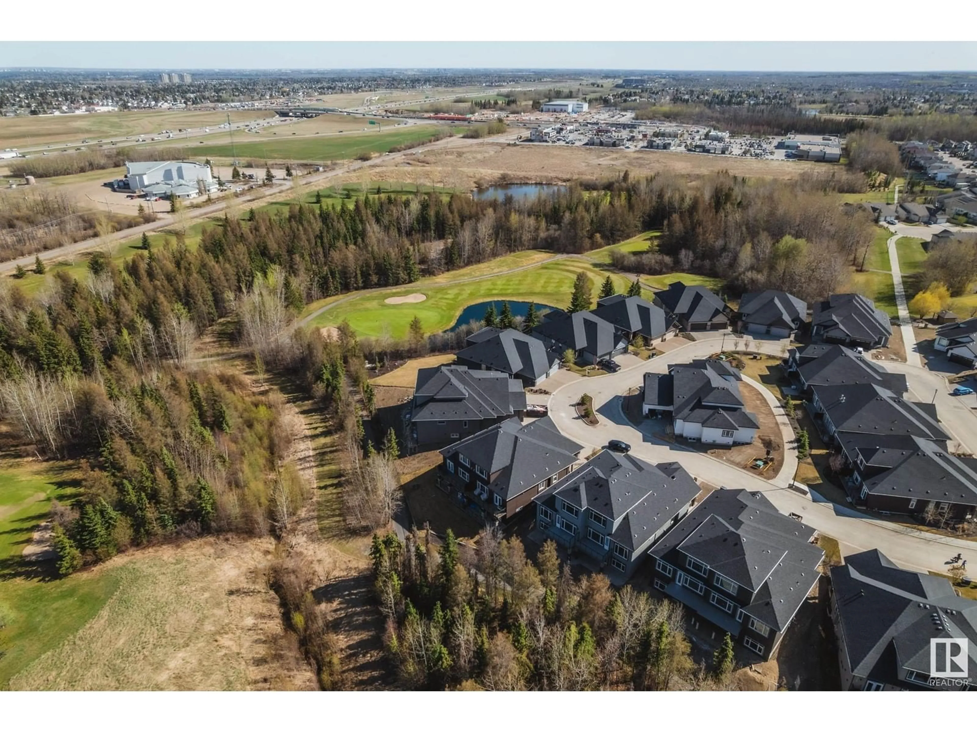 A pic from outside/outdoor area/front of a property/back of a property/a pic from drone, mountain view for #9 - 20425 93 AV, Edmonton Alberta T5T7C7