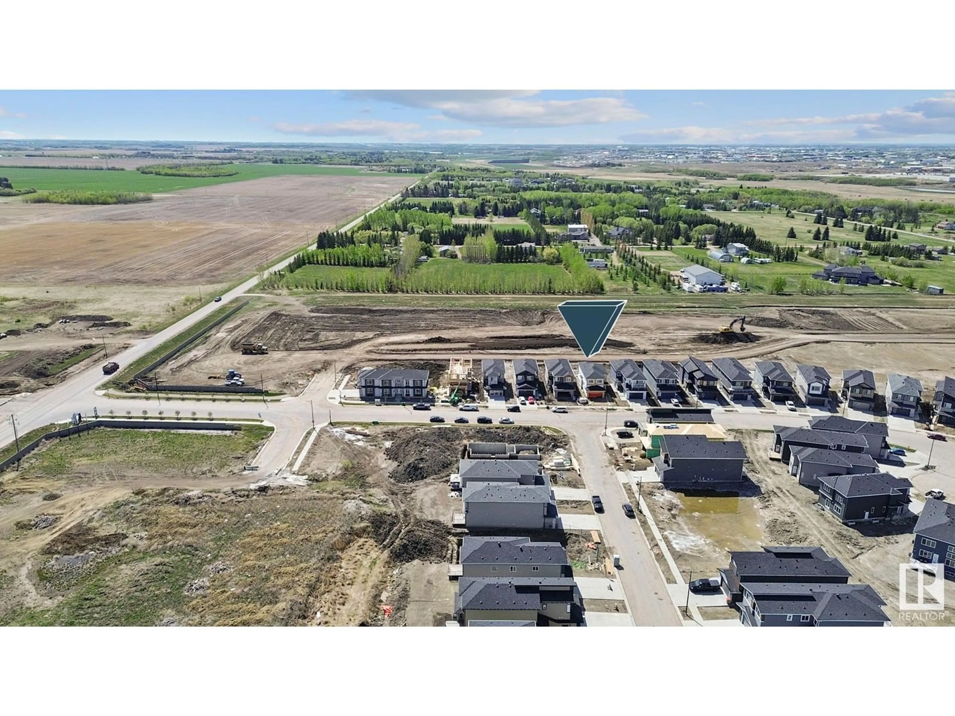 A pic from outside/outdoor area/front of a property/back of a property/a pic from drone, mountain view for 1915 63 AV, Rural Leduc County Alberta T4X3C9