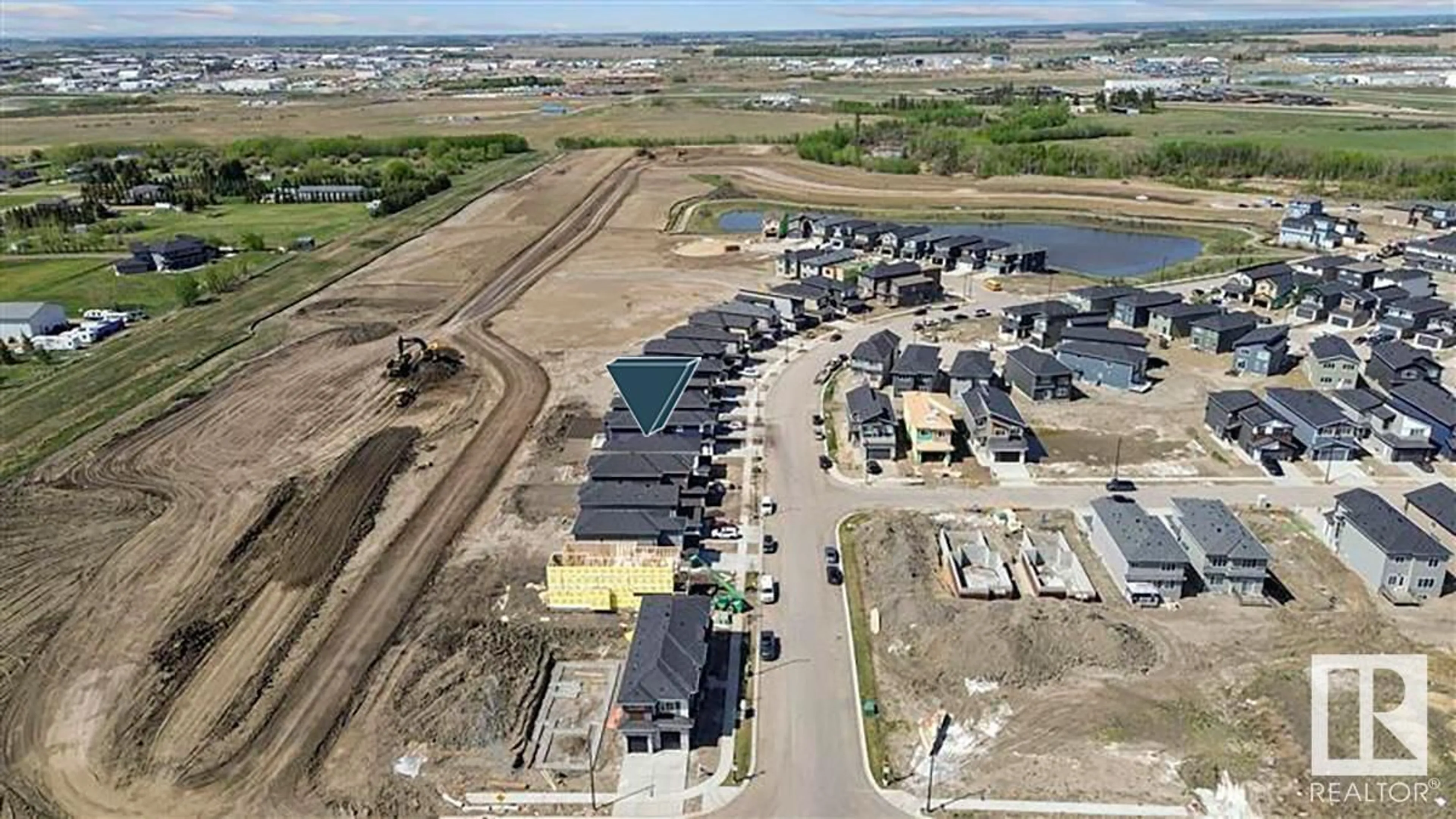 A pic from outside/outdoor area/front of a property/back of a property/a pic from drone, building for 1915 63 AV, Rural Leduc County Alberta T4X3C9
