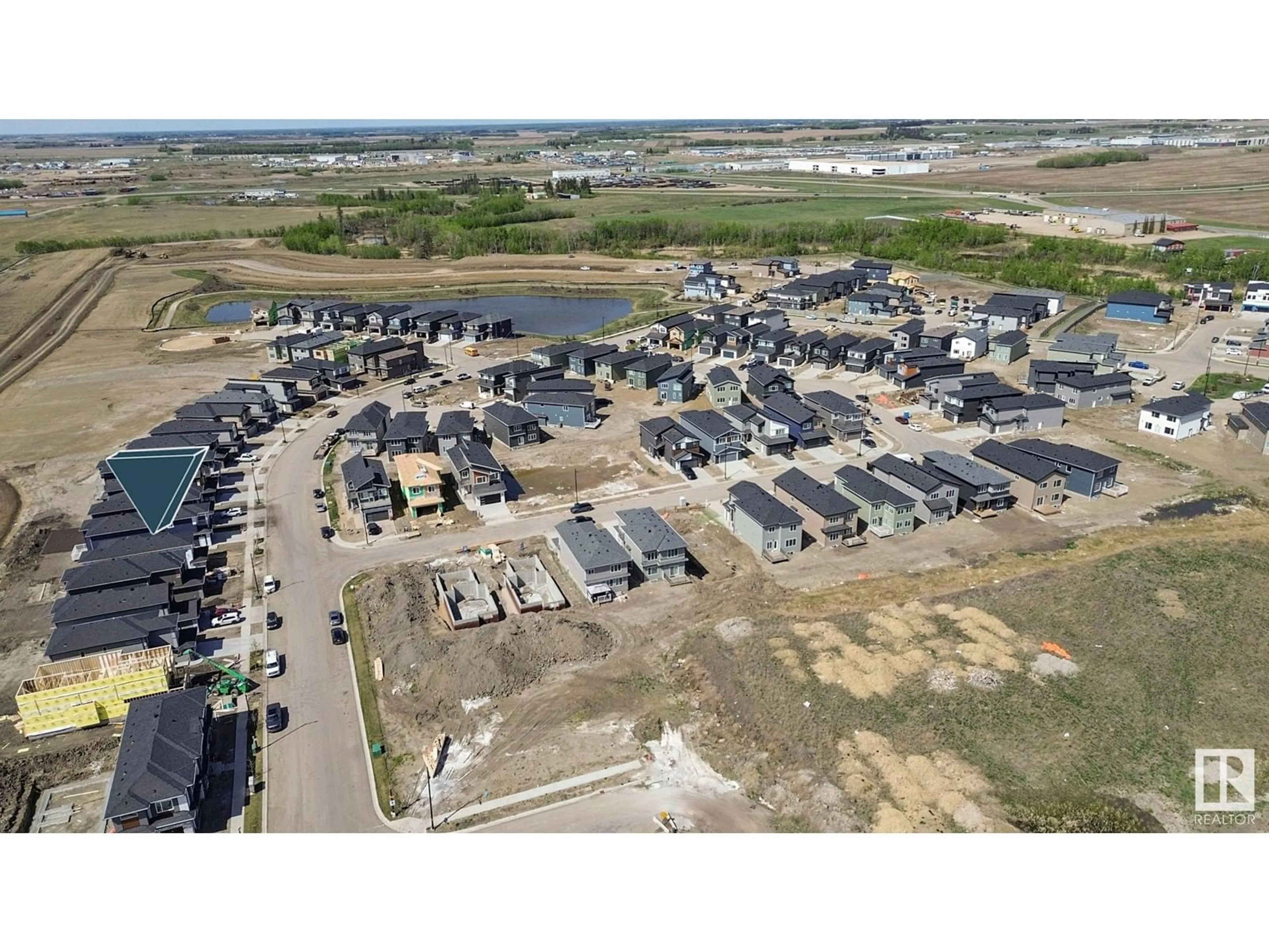 A pic from outside/outdoor area/front of a property/back of a property/a pic from drone, street for 1915 63 AV, Rural Leduc County Alberta T4X3C9