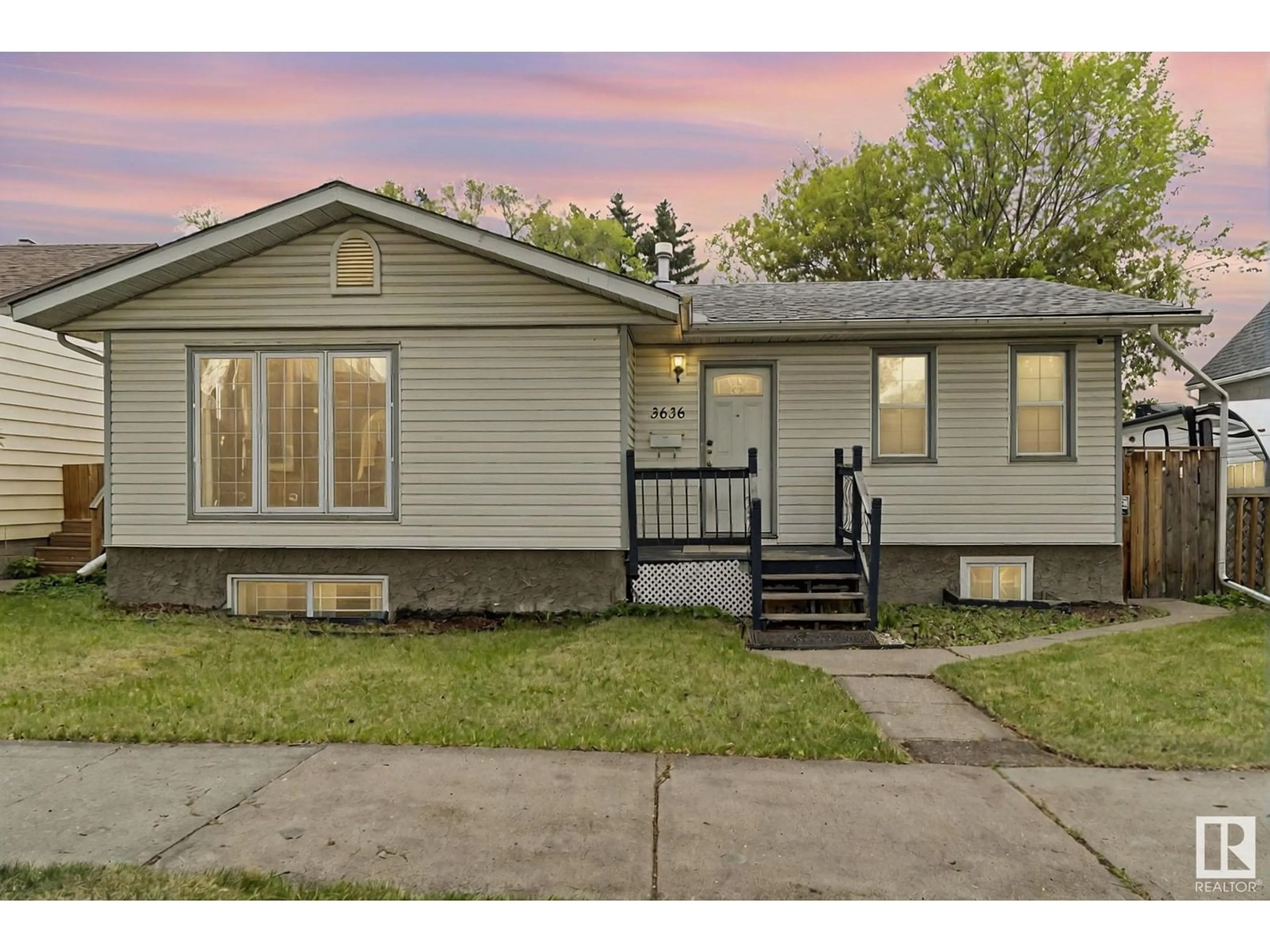Home with vinyl exterior material, street for NW - 3636 116 AV, Edmonton Alberta T5W0E6