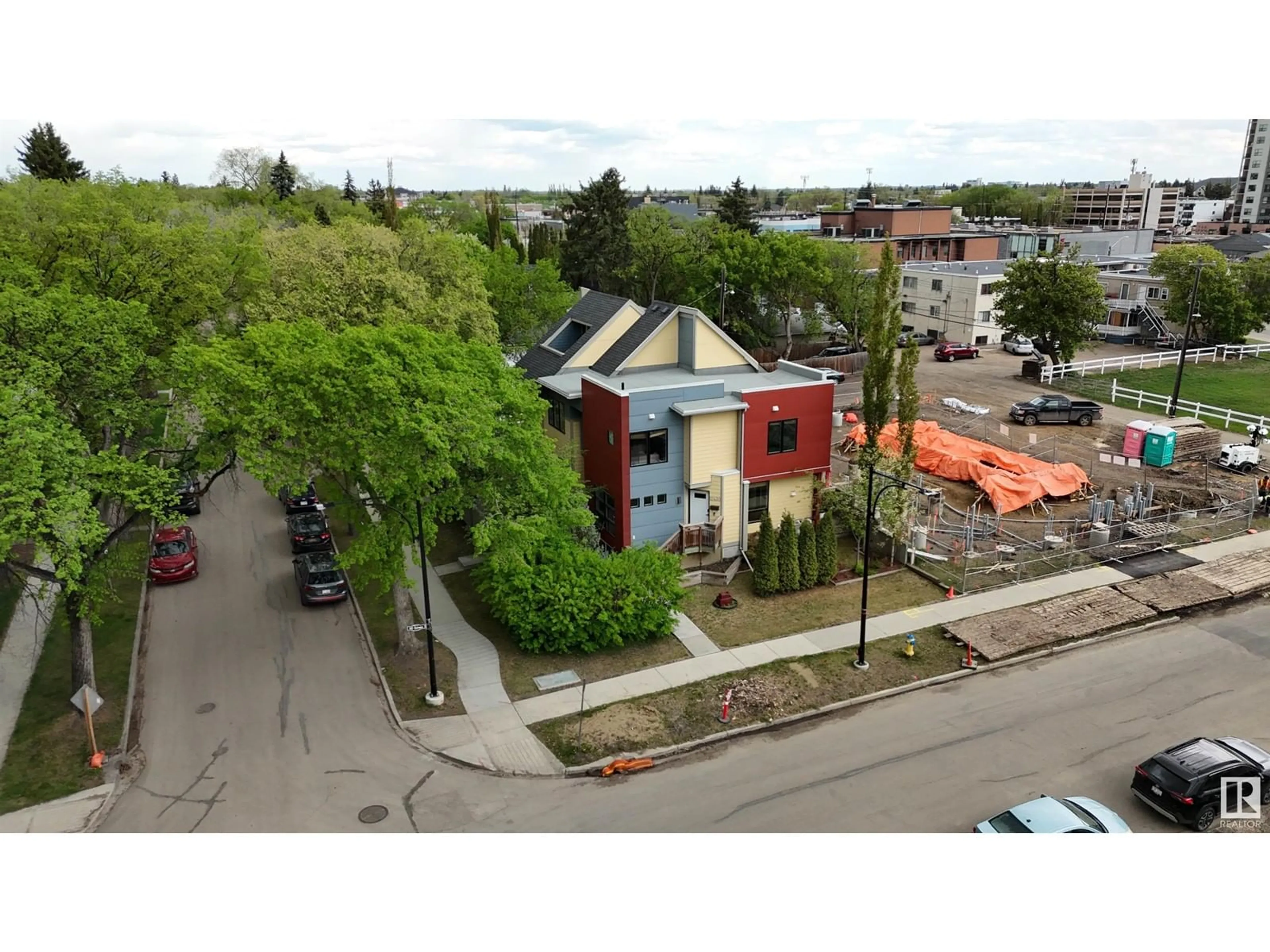 A pic from outside/outdoor area/front of a property/back of a property/a pic from drone, street for 12430 105 AV, Edmonton Alberta T5N0Y6