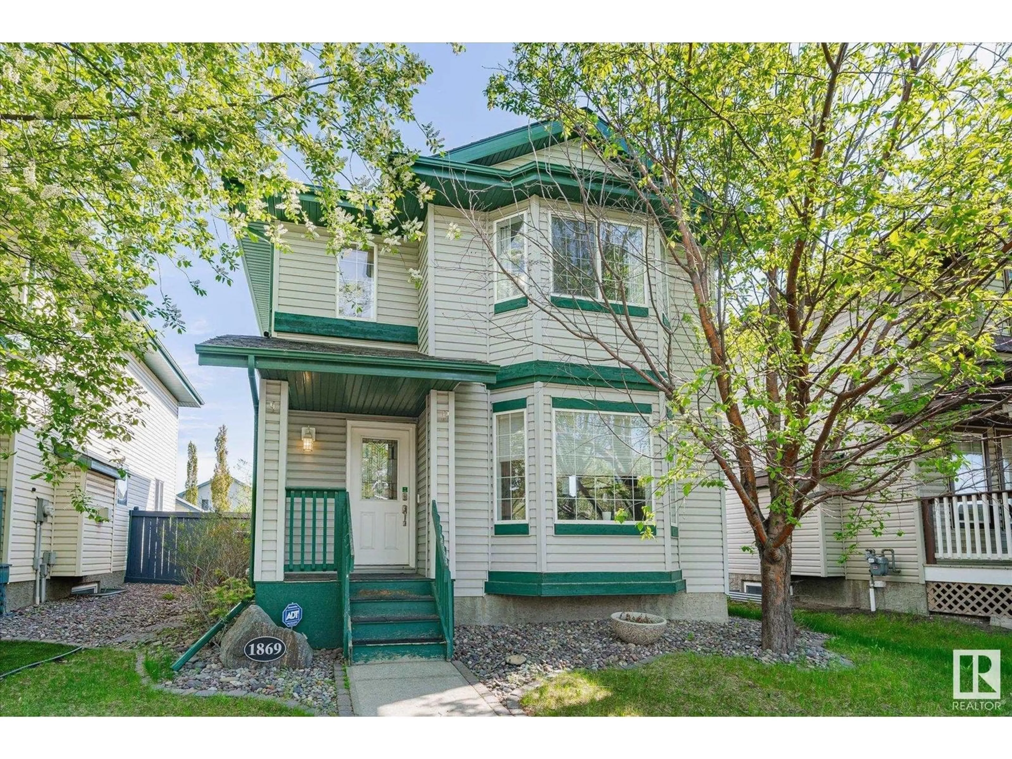 Home with vinyl exterior material, street for NW - 1869 TOWNE CENTER BV, Edmonton Alberta T6R3J6