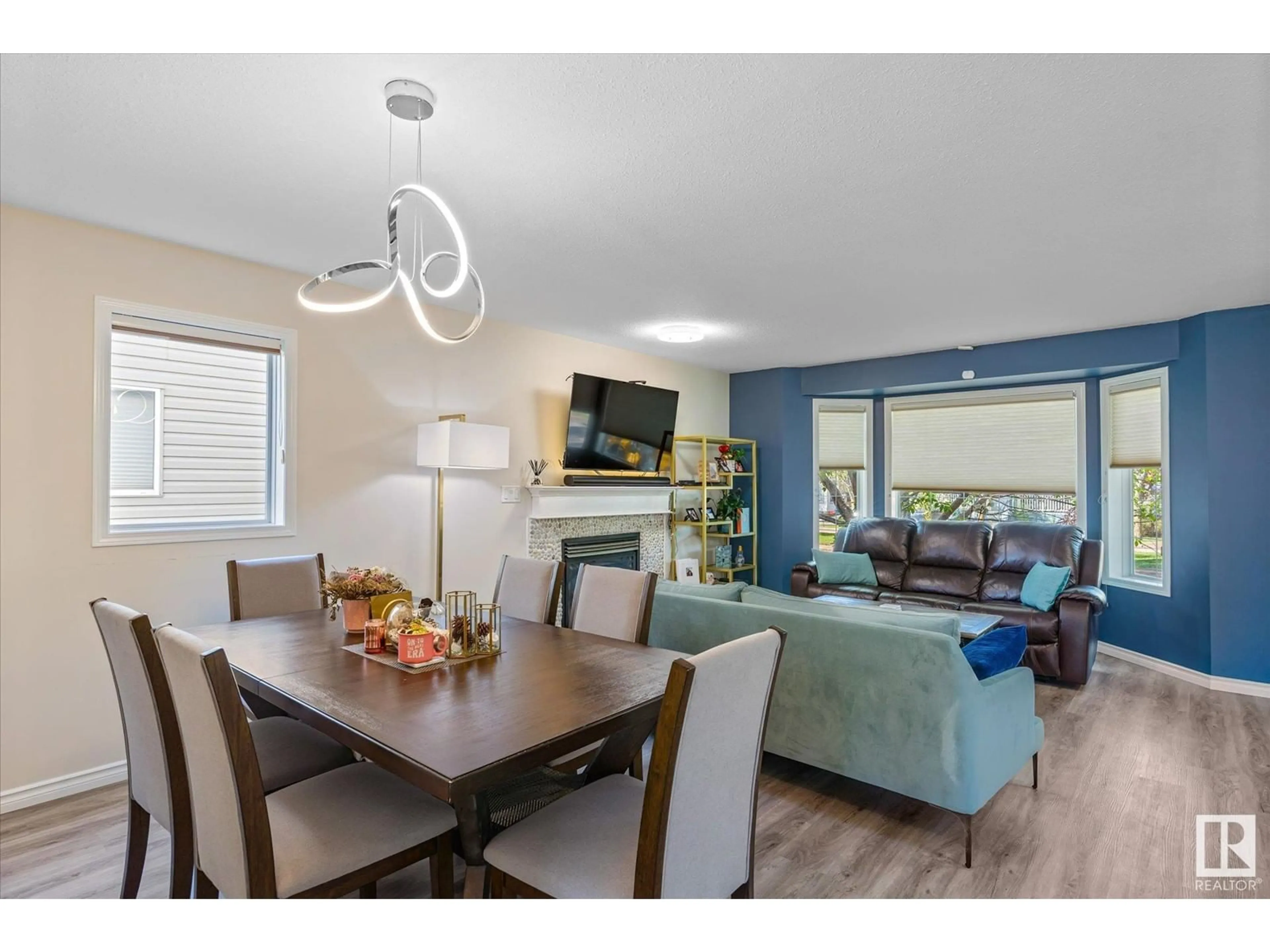 Living room with furniture, wood/laminate floor for NW - 1869 TOWNE CENTER BV, Edmonton Alberta T6R3J6