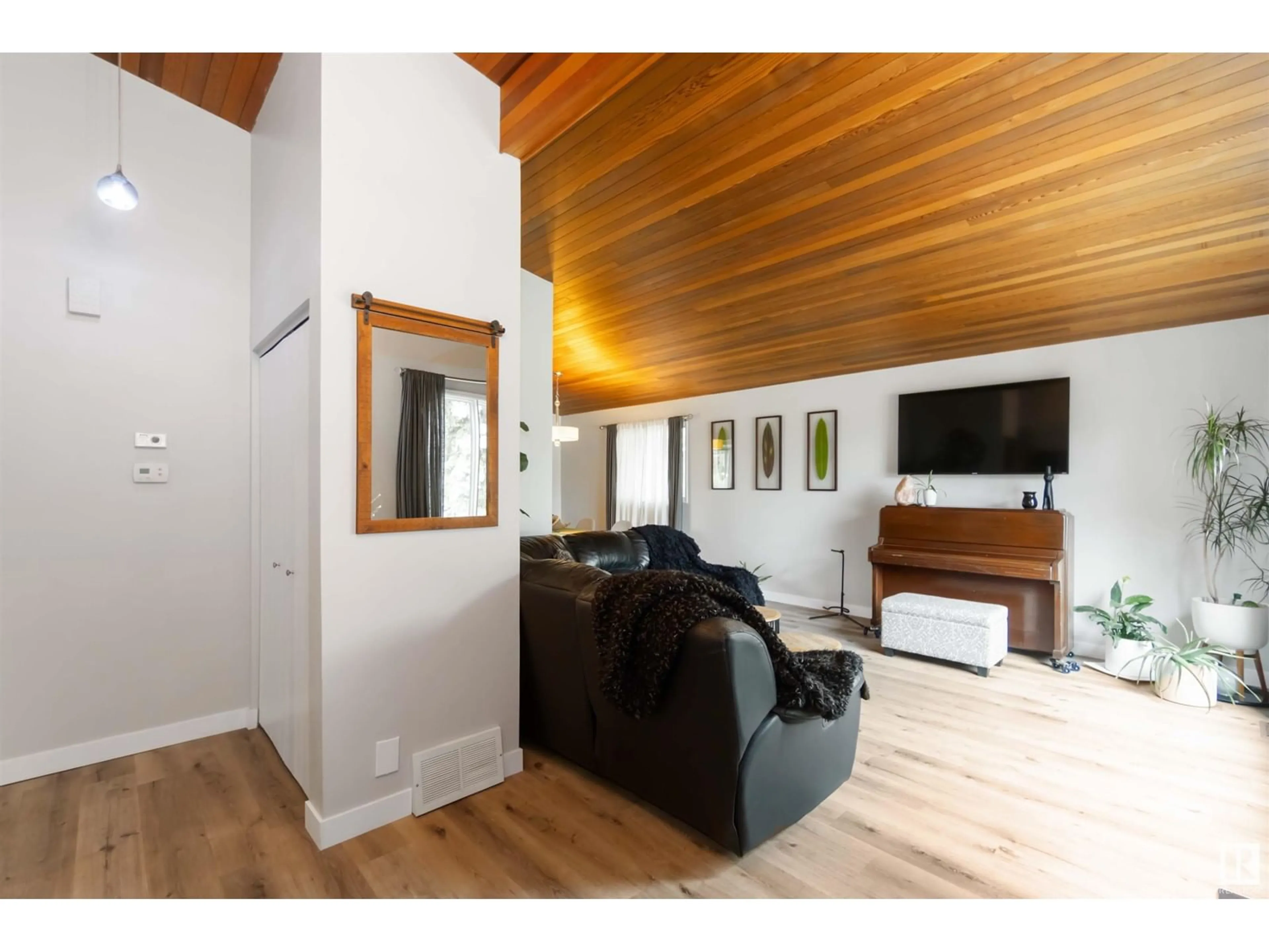 Living room with furniture, wood/laminate floor for 9820 185 ST, Edmonton Alberta T5T3E5