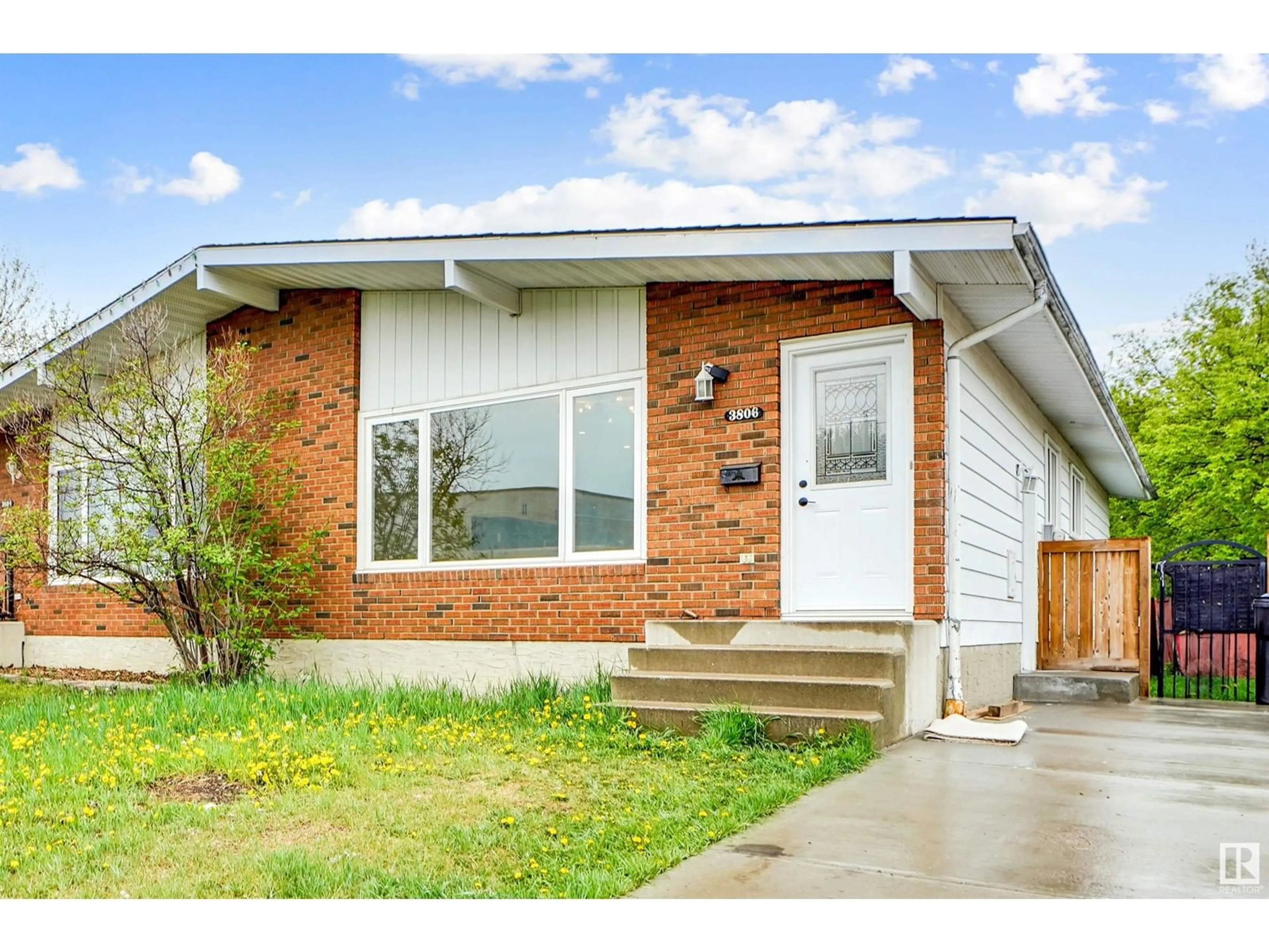 Home with brick exterior material, street for NW - 3806 85 ST, Edmonton Alberta T6K0H6