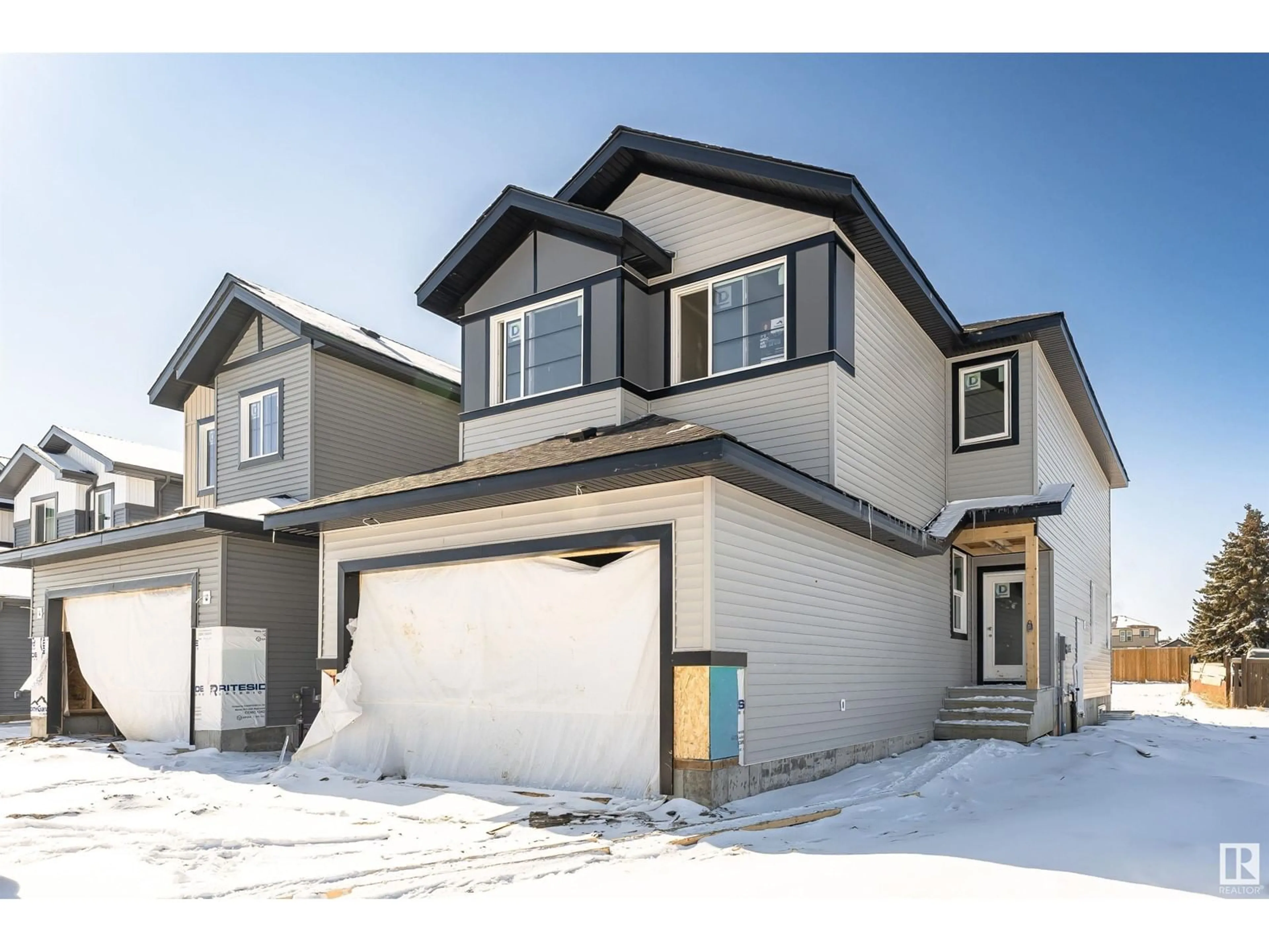 Home with vinyl exterior material, street for 7 PATRIOT WY, Spruce Grove Alberta T7X2W6