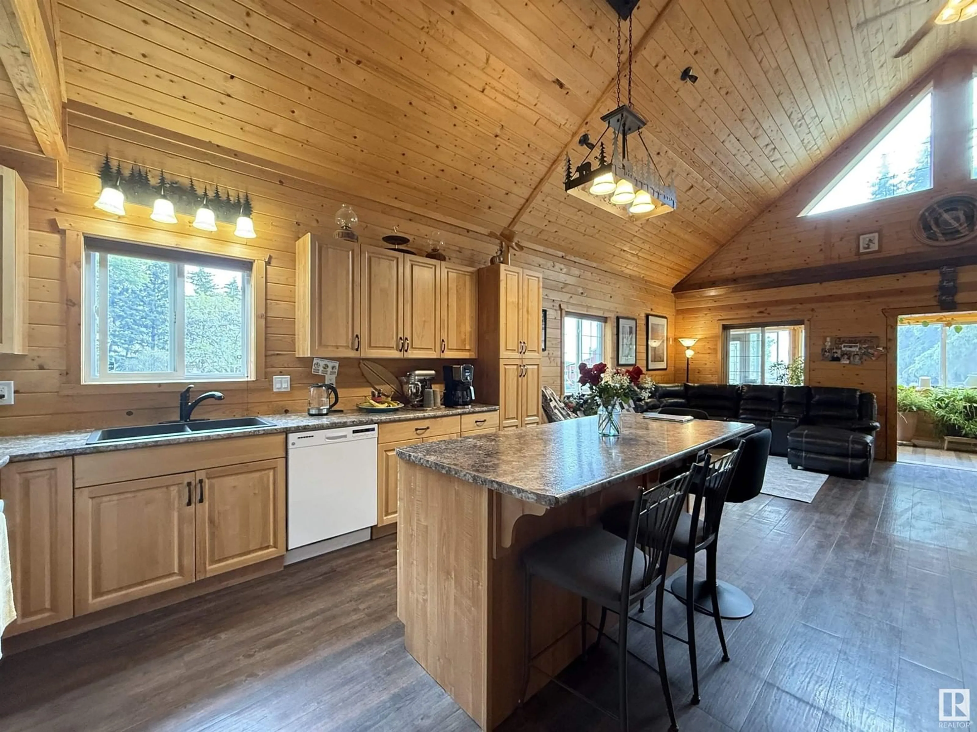 Open concept kitchen, wood/laminate floor for 54115 HWY 44, Rural Sturgeon County Alberta T8T0J6