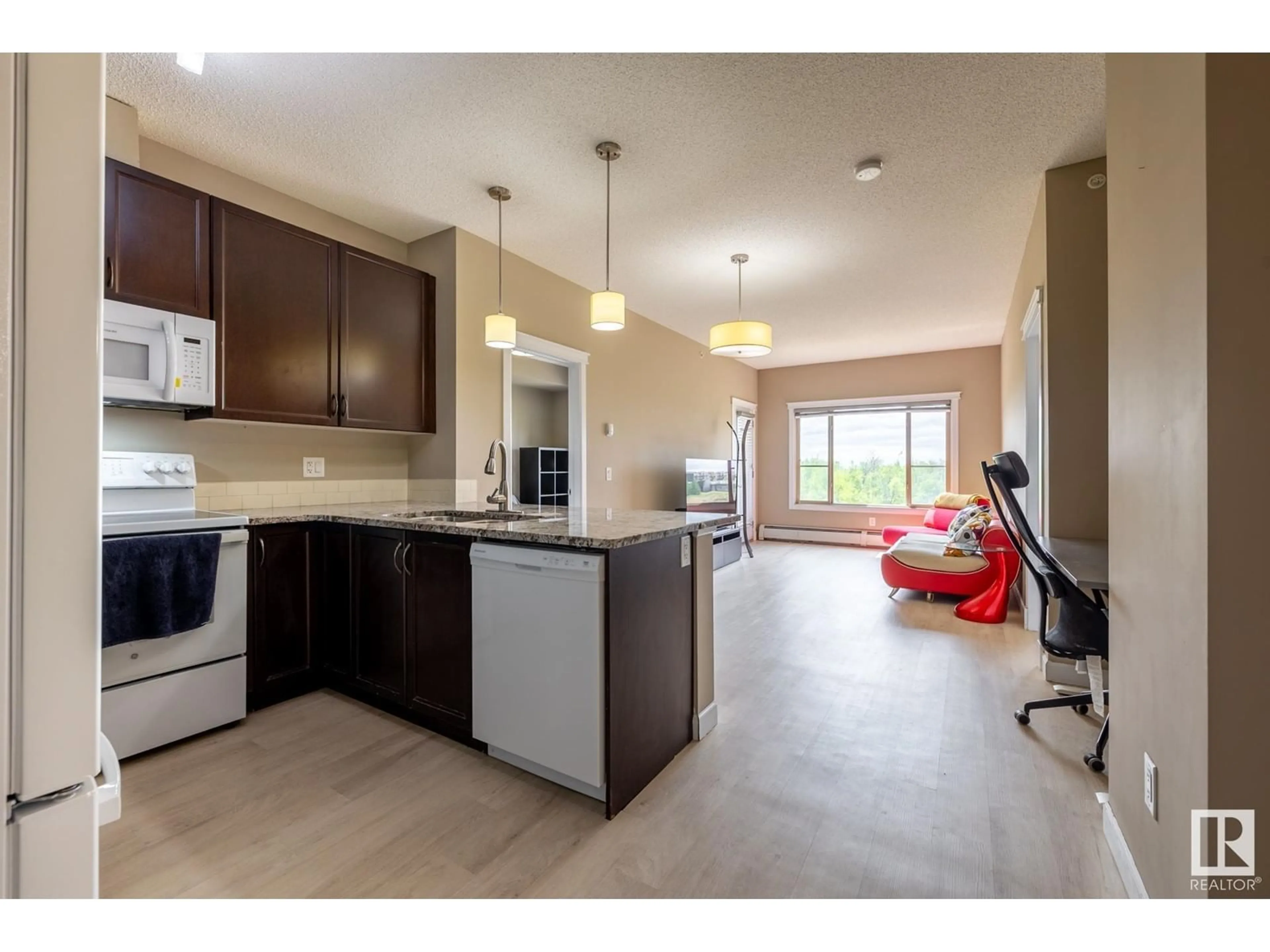 Open concept kitchen, unknown for #413 - 3715 WHITELAW LN, Edmonton Alberta T6W2C3