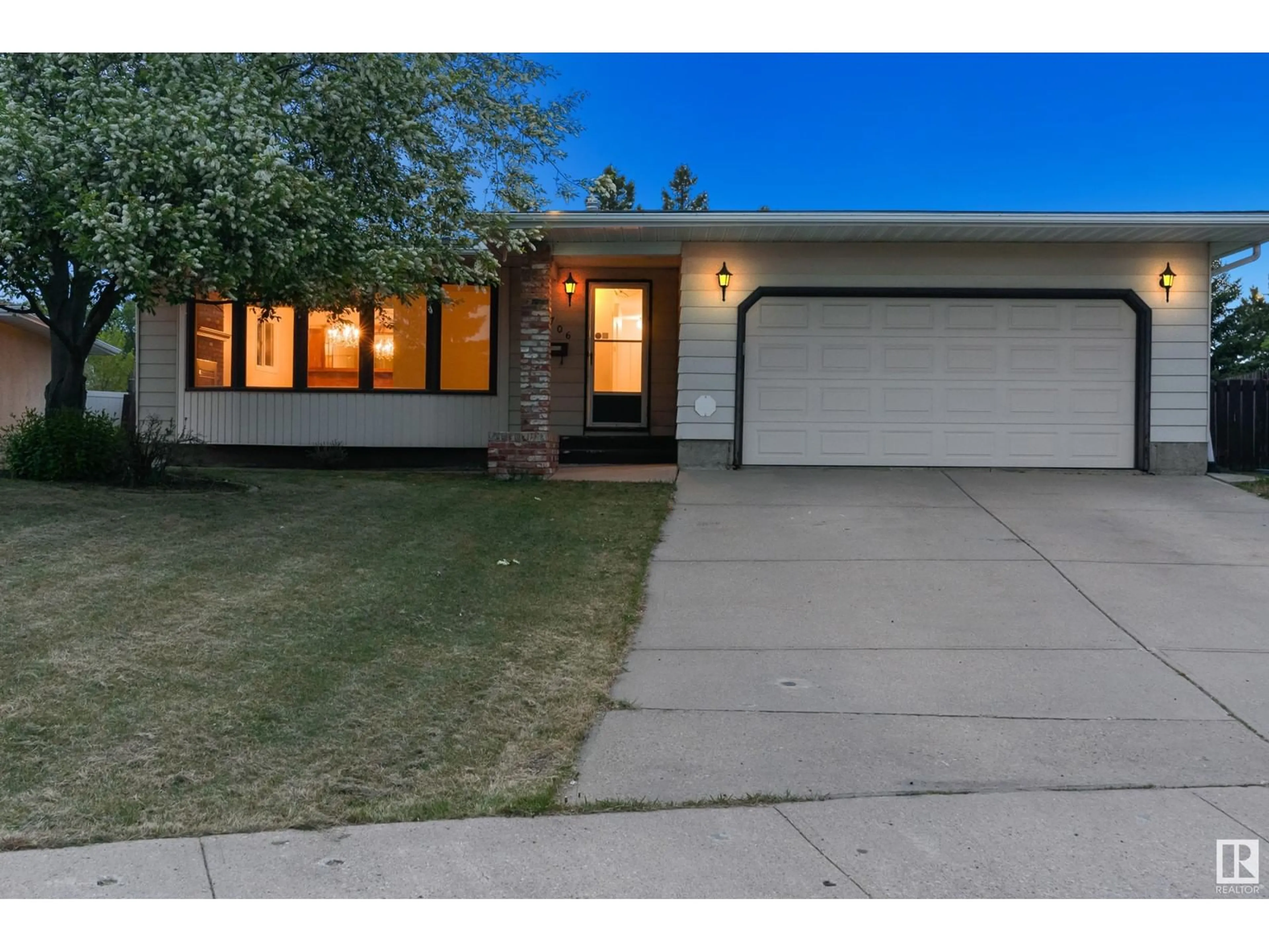 Home with vinyl exterior material, street for 3706 136A AV NW, Edmonton Alberta T5A2P4