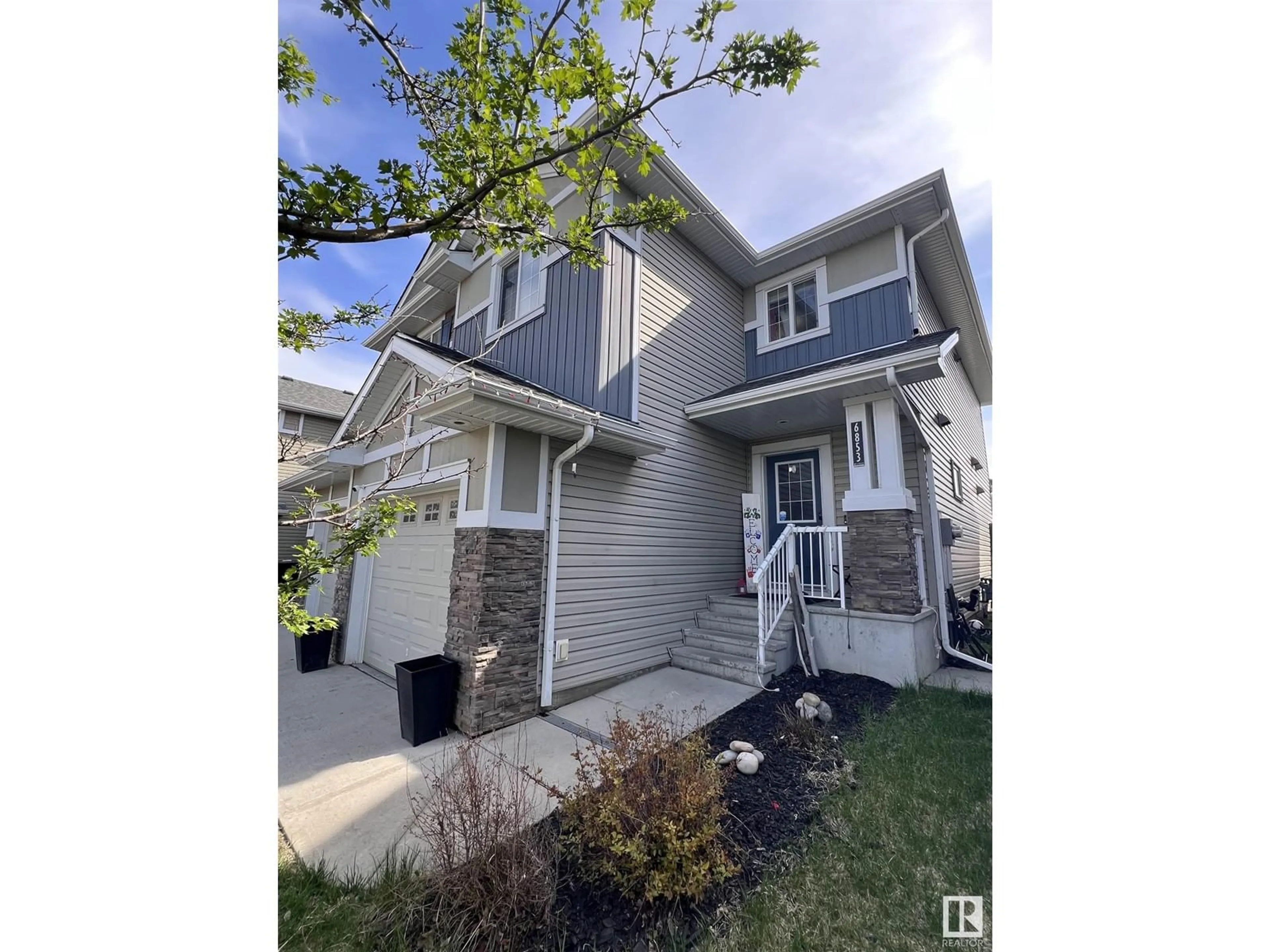 Home with vinyl exterior material, street for 6853 CARDINAL LINK LI, Edmonton Alberta T6W1Z1