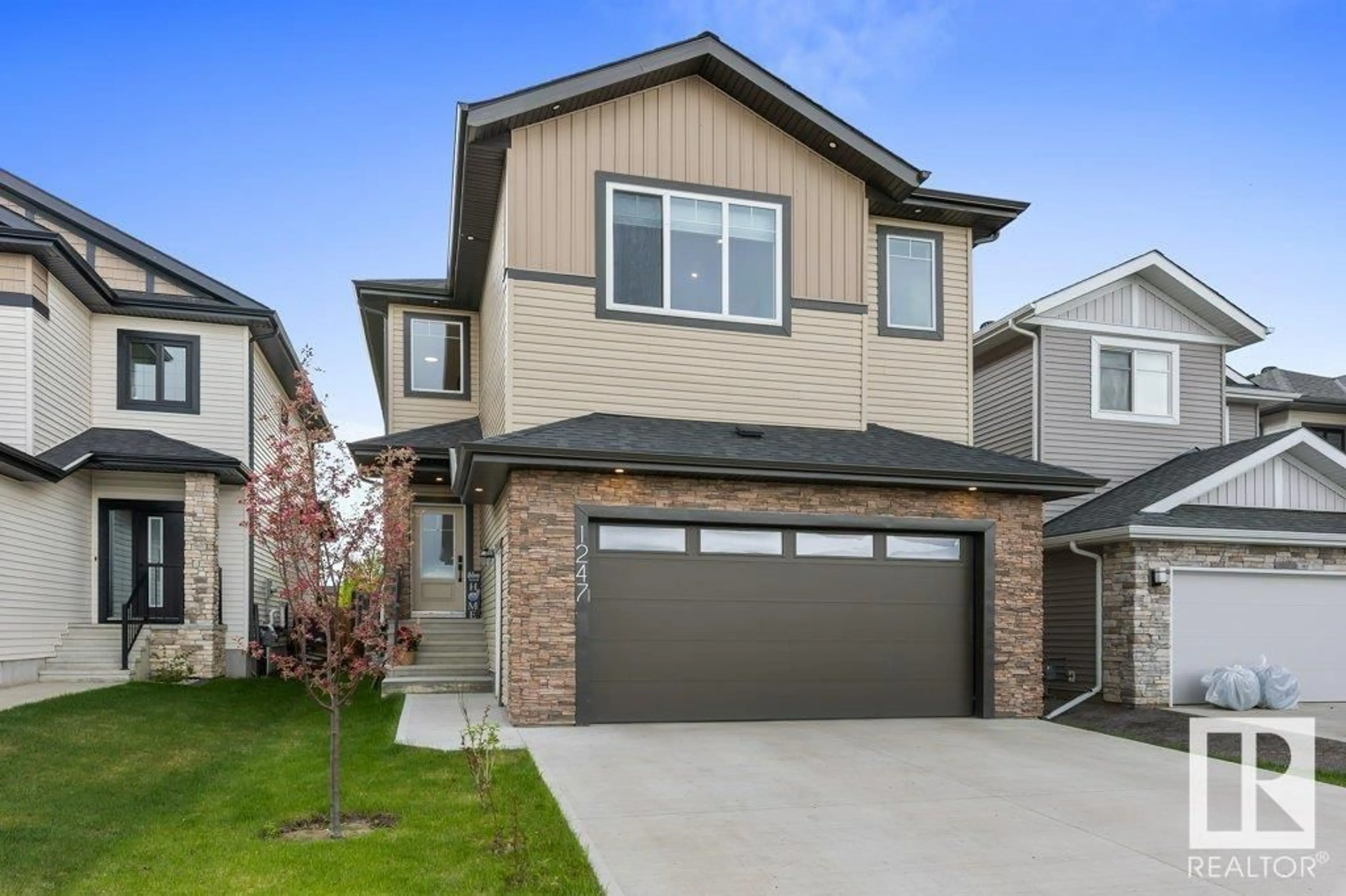 Home with brick exterior material, street for 1247 CALAHOO RD, Spruce Grove Alberta T7X4R5