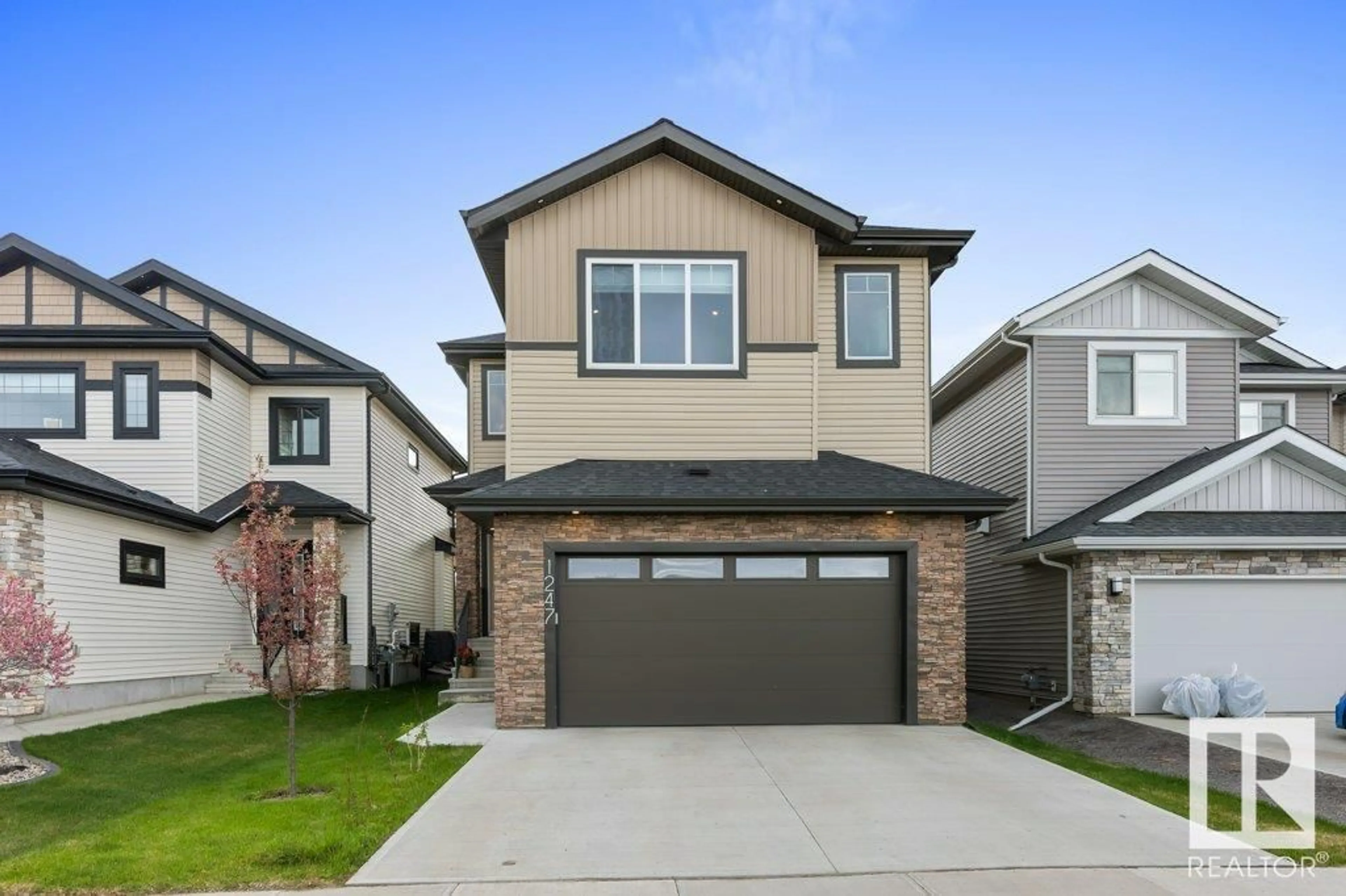 Home with vinyl exterior material, street for 1247 CALAHOO RD, Spruce Grove Alberta T7X4R5