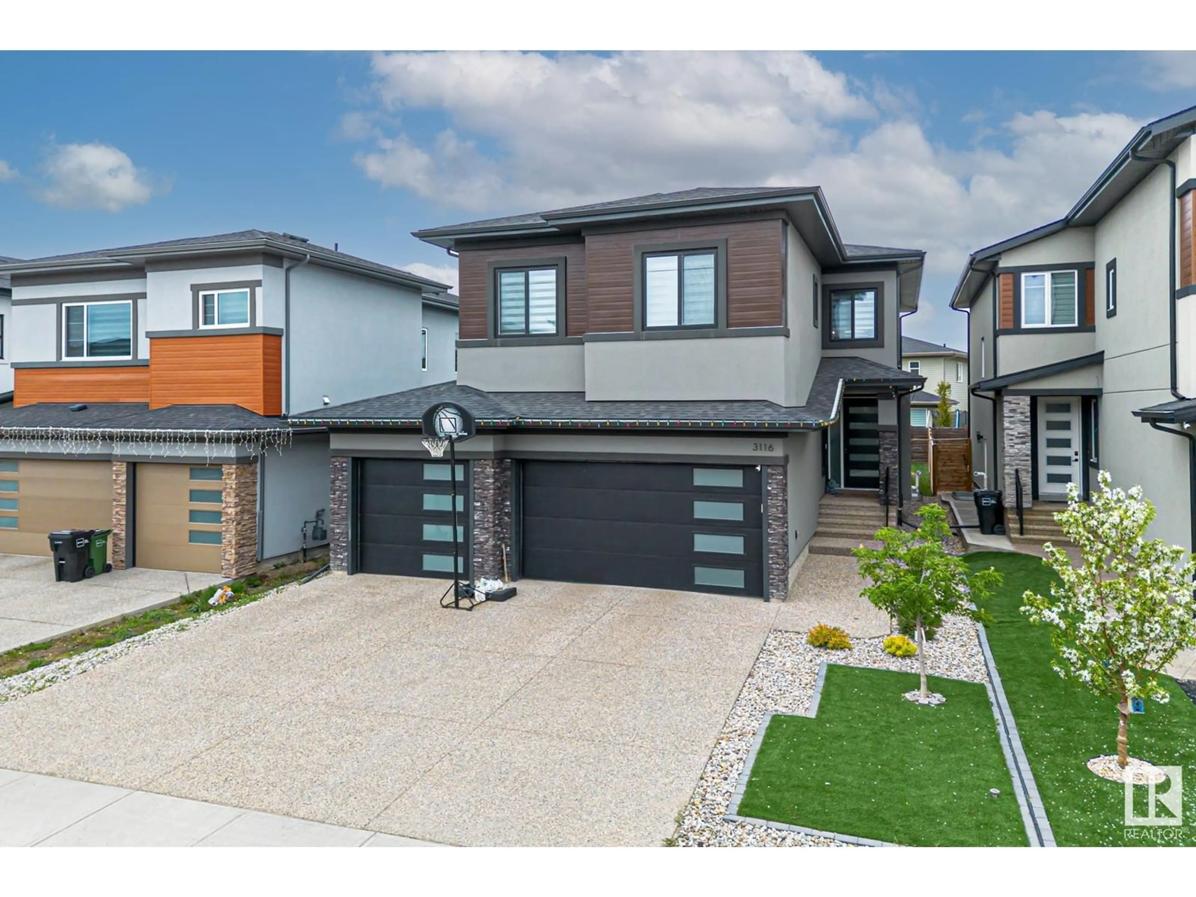 Home with brick exterior material, street for SW - 3116 KOSTASH GREEN GR, Edmonton Alberta T6W4K3