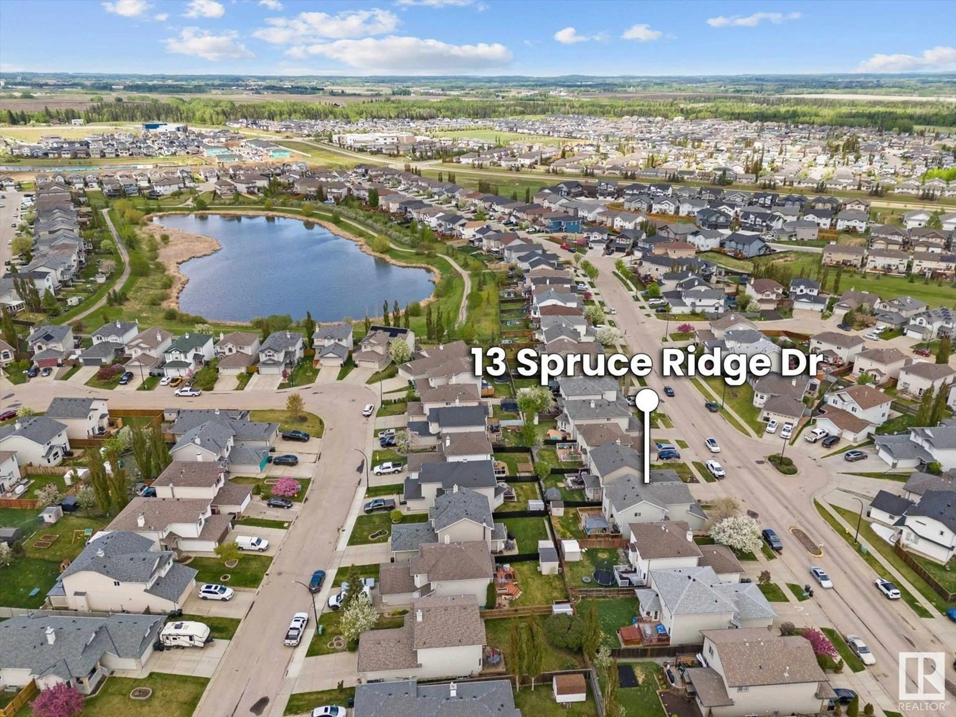 A pic from outside/outdoor area/front of a property/back of a property/a pic from drone, street for 13 SPRUCE RIDGE DR, Spruce Grove Alberta T7X4M8