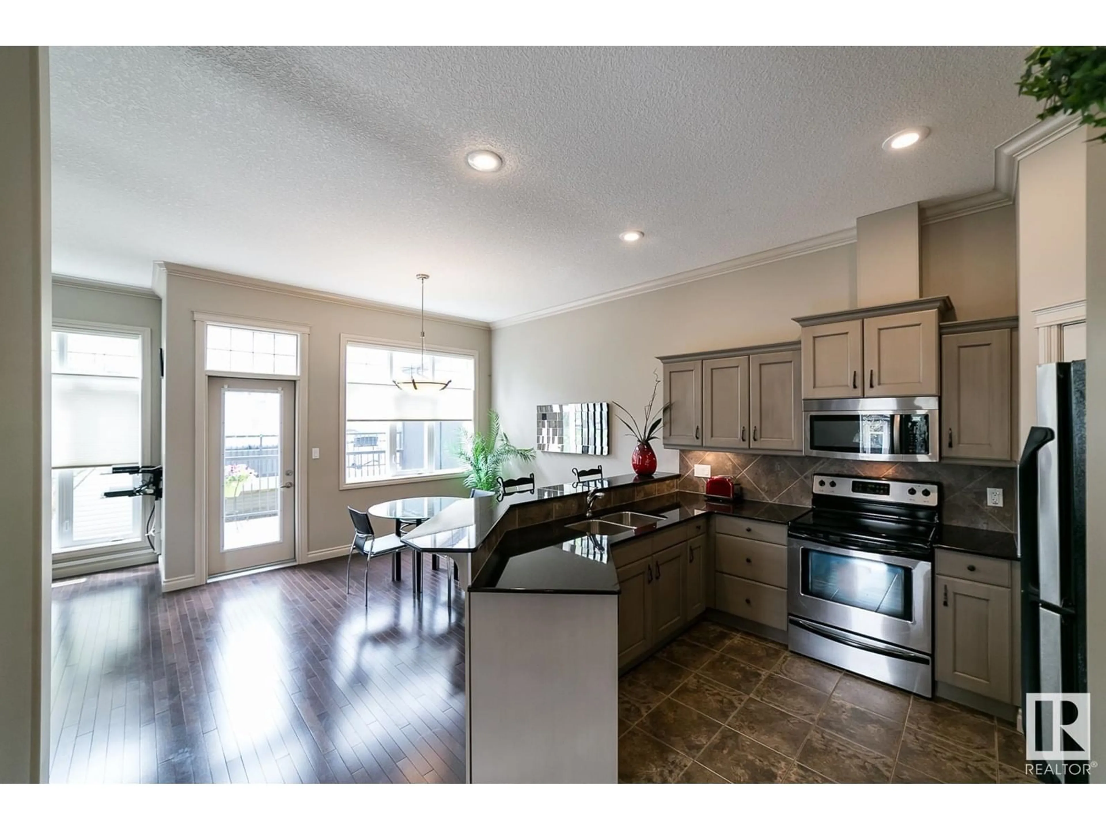 Open concept kitchen, unknown for 12610 15 AV SW, Edmonton Alberta T6W1X1