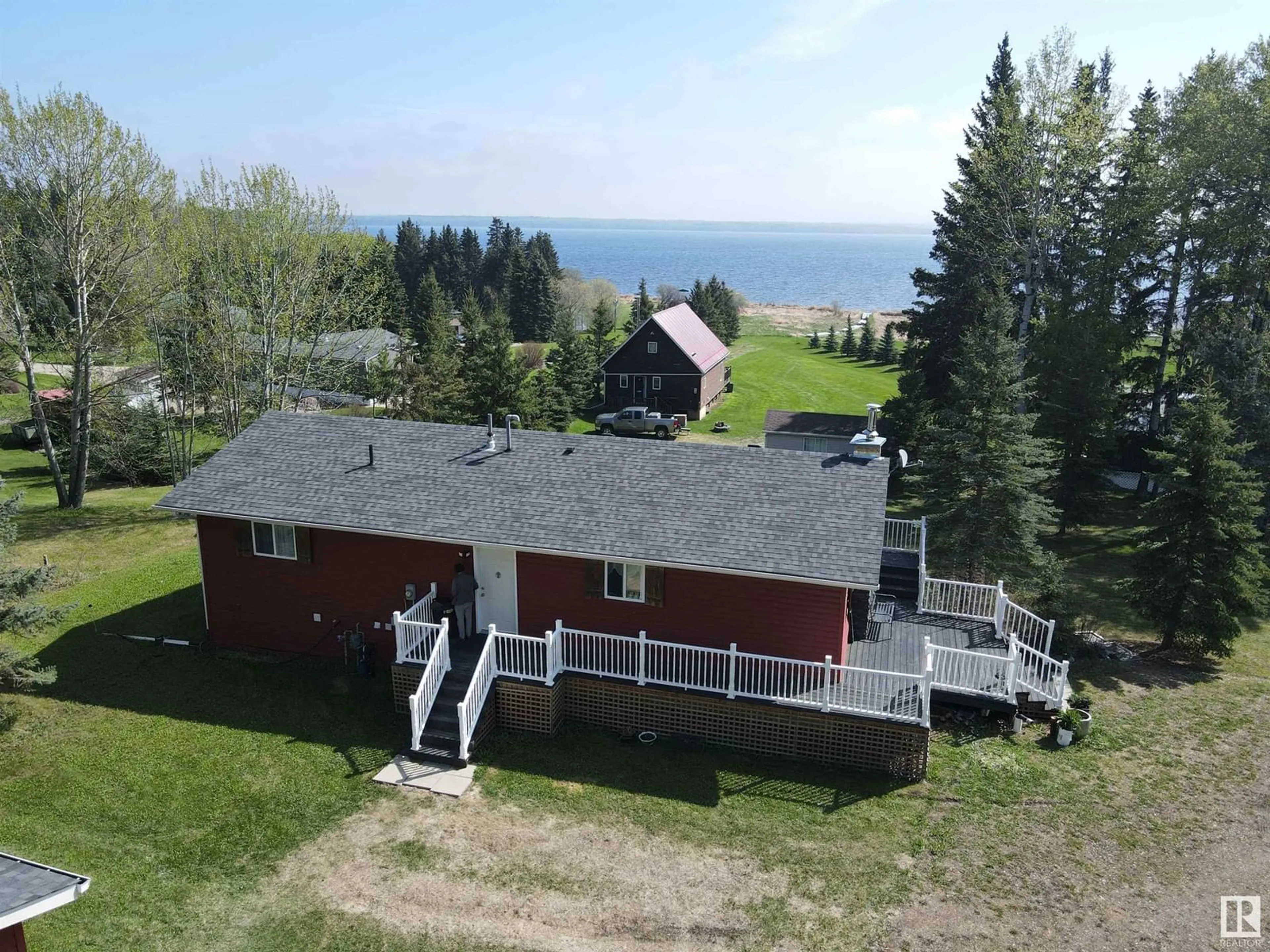 A pic from outside/outdoor area/front of a property/back of a property/a pic from drone, water/lake/river/ocean view for W - 118 2 ST, Rural Wetaskiwin County Alberta T0C0A0