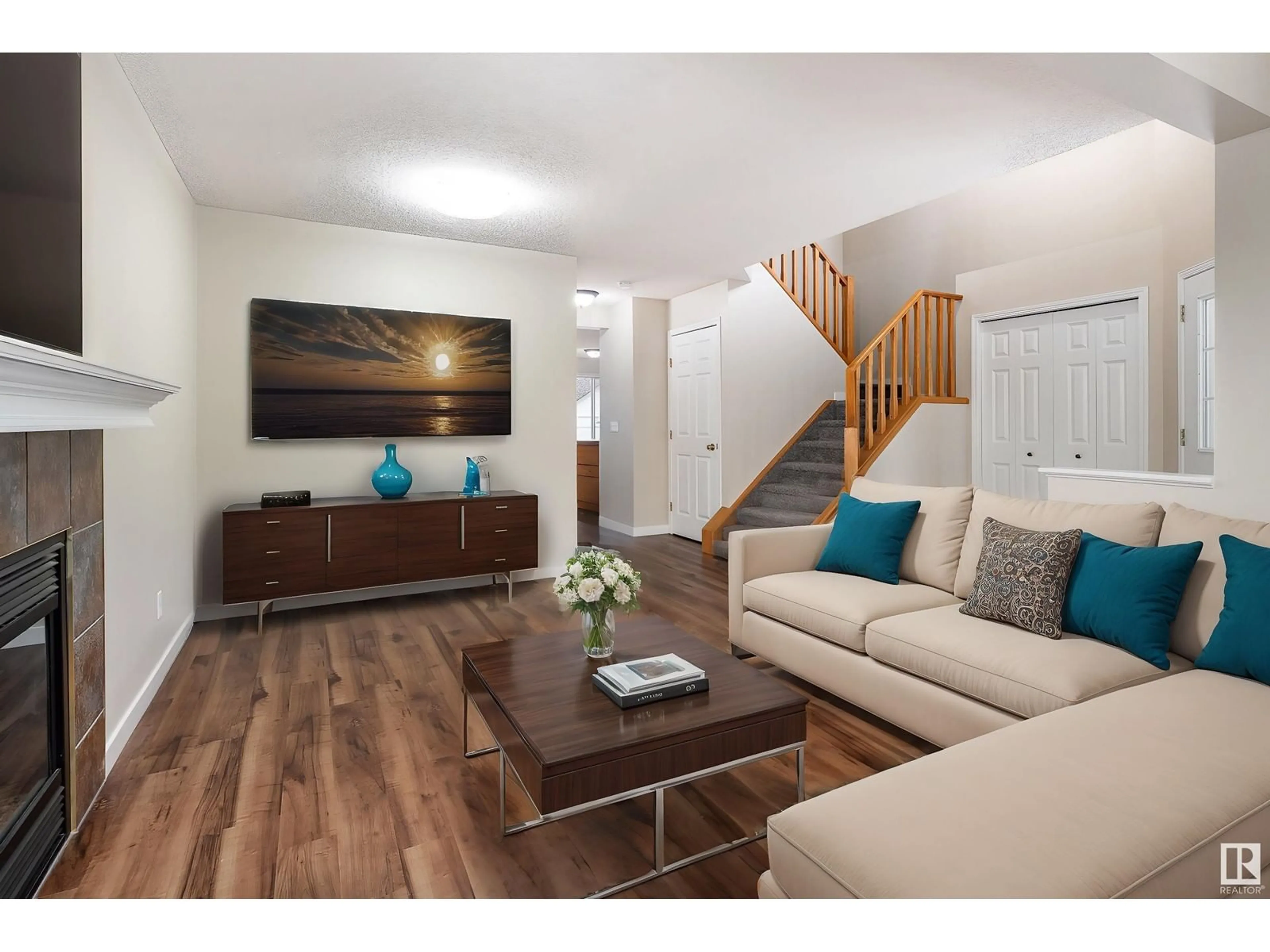 Living room with furniture, wood/laminate floor for 1688 TOMPKINS WD, Edmonton Alberta T6R2Y4