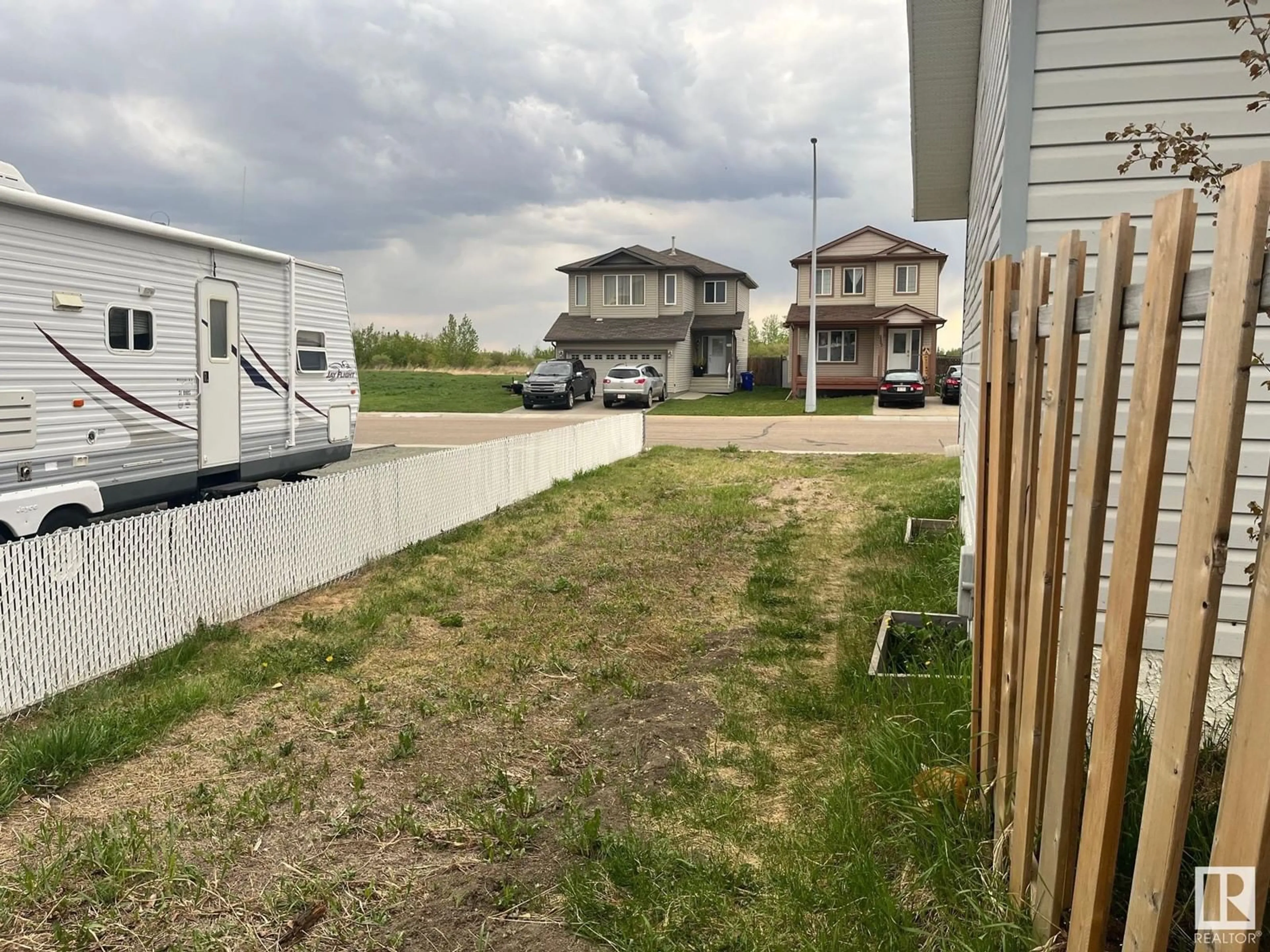 A pic from outside/outdoor area/front of a property/back of a property/a pic from drone, water/lake/river/ocean view for 5506 45 ST, Bruderheim Alberta T0B0S0