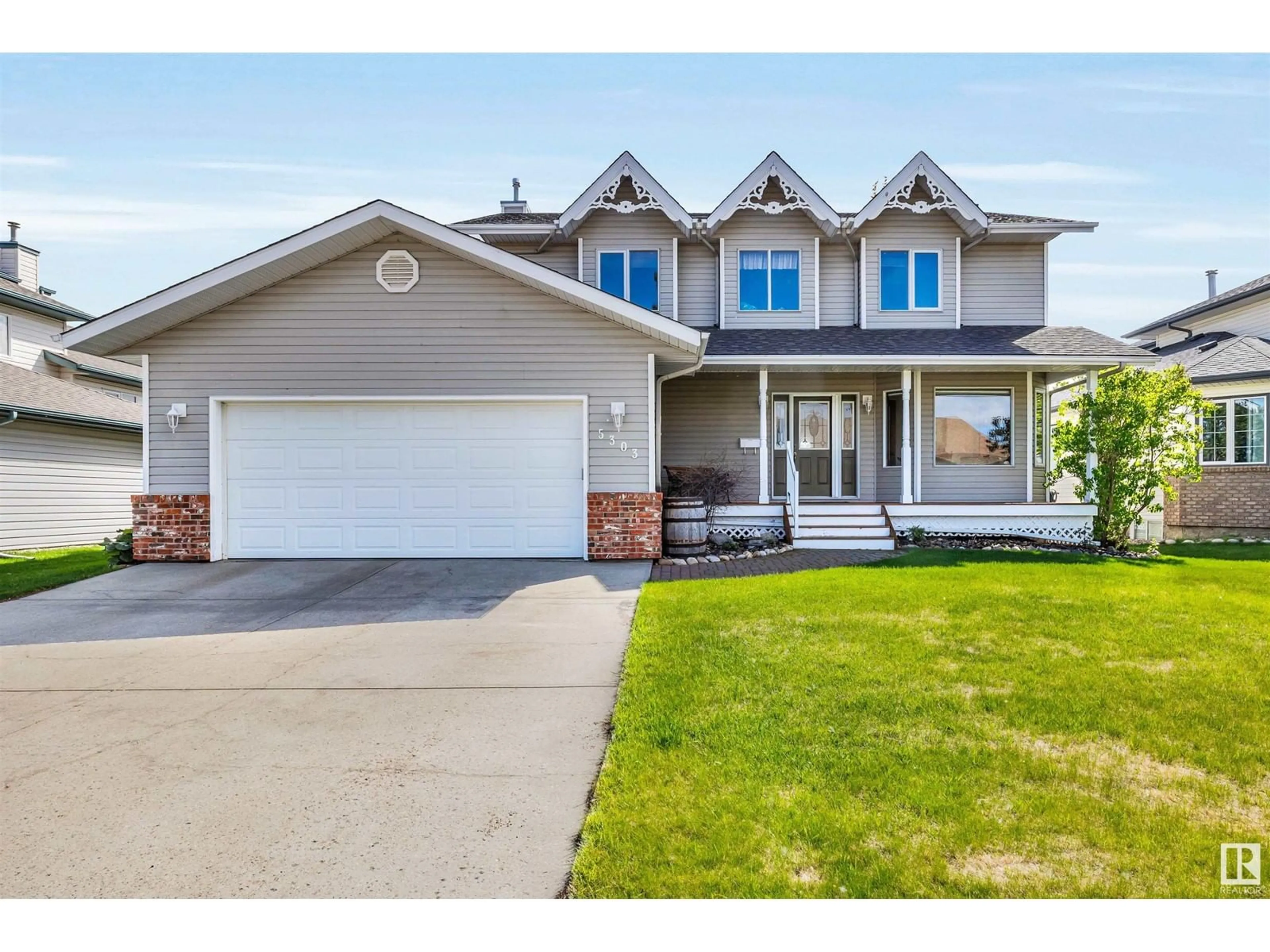 Home with vinyl exterior material, street for 5303 40 AV, Beaumont Alberta T4X1L9