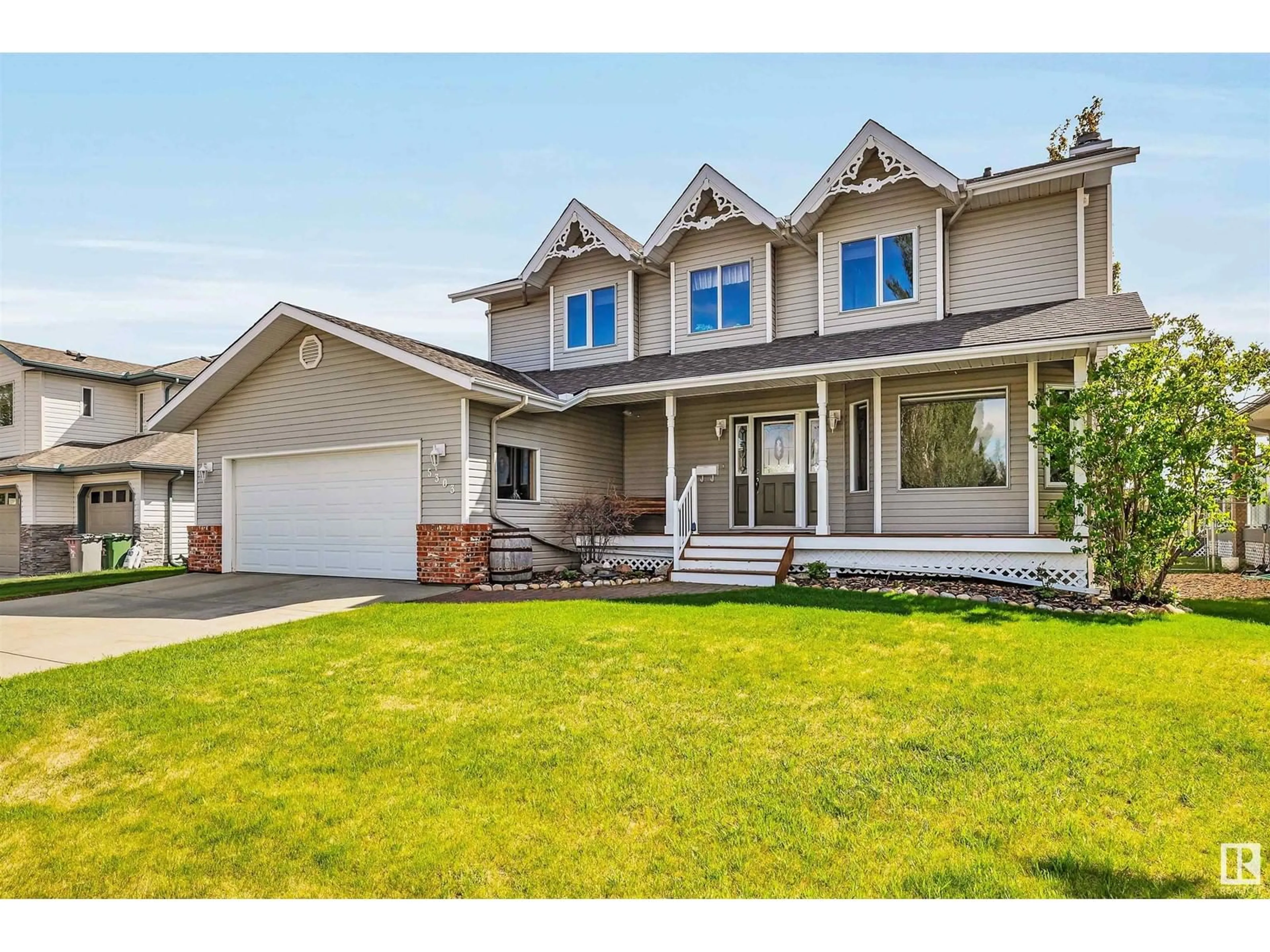 Home with vinyl exterior material, street for 5303 40 AV, Beaumont Alberta T4X1L9