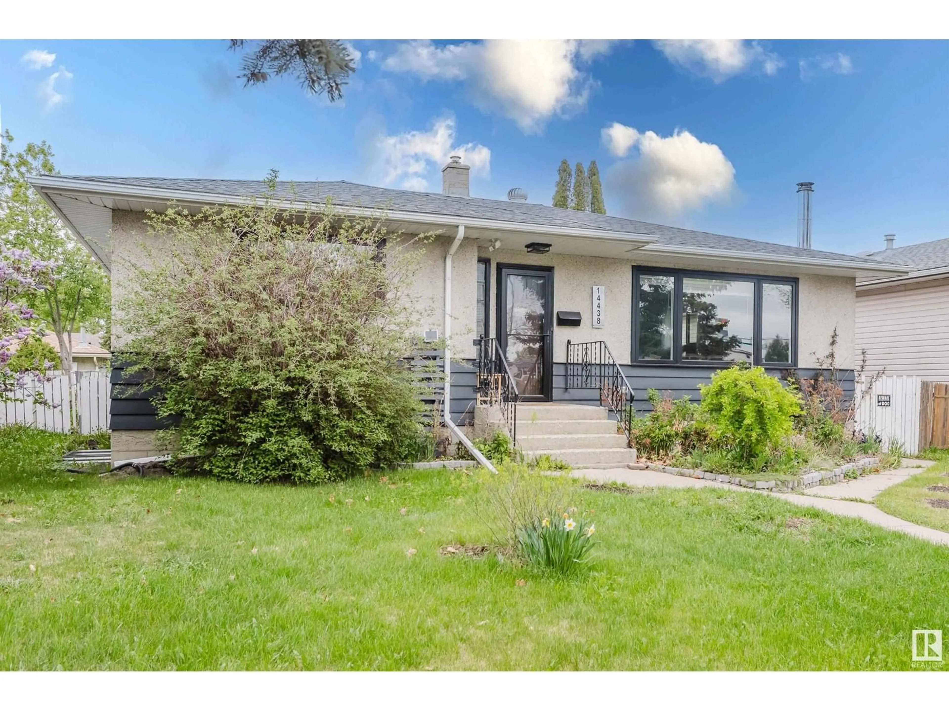 Home with vinyl exterior material, street for 14438 MCQUEEN RD, Edmonton Alberta T5N3L6