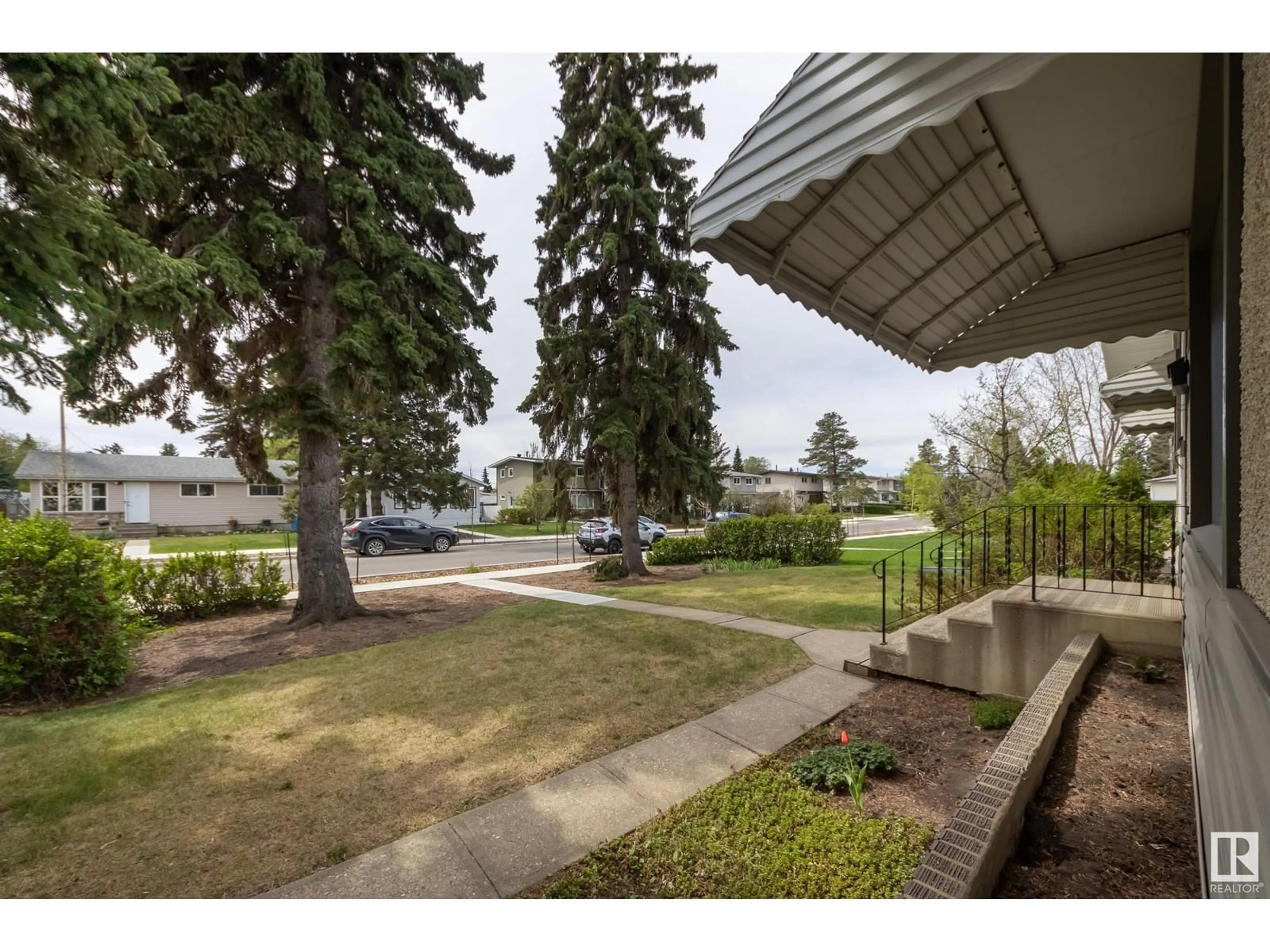 Patio, street for 10804 52 AV, Edmonton Alberta T6H0P3