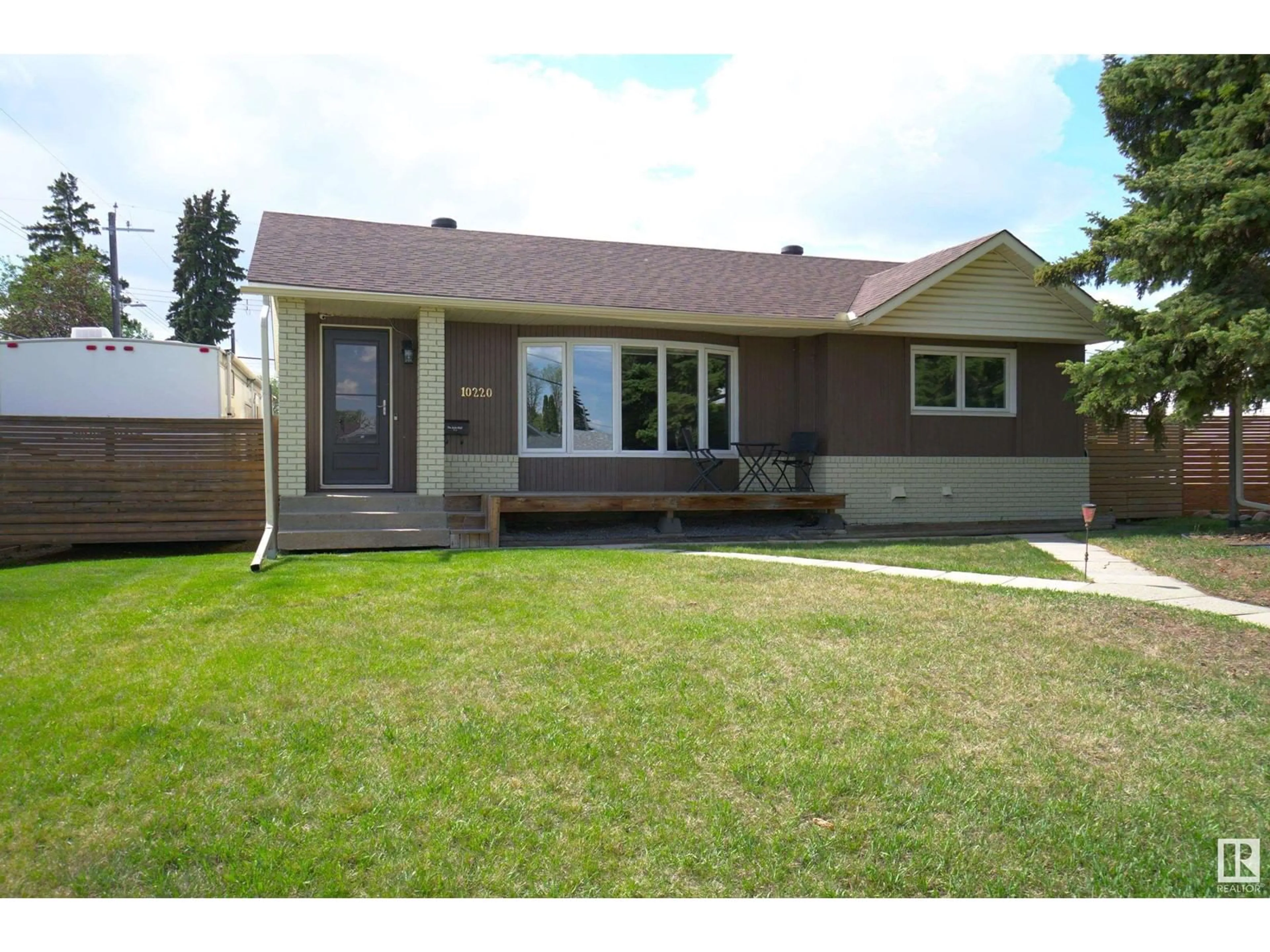 Home with vinyl exterior material, street for NW - 10220 62 ST, Edmonton Alberta T6A2L8