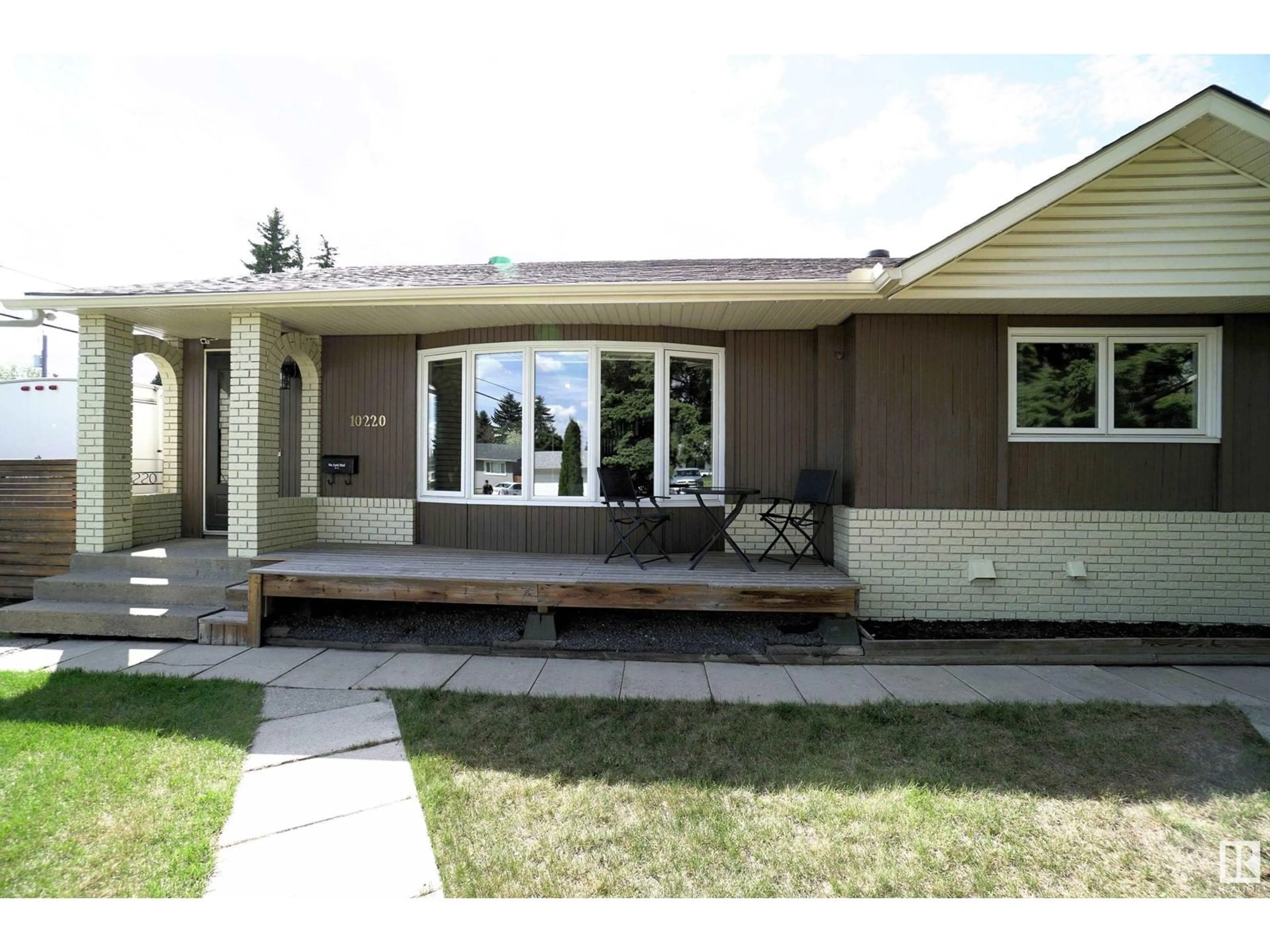 Home with vinyl exterior material, street for NW - 10220 62 ST, Edmonton Alberta T6A2L8