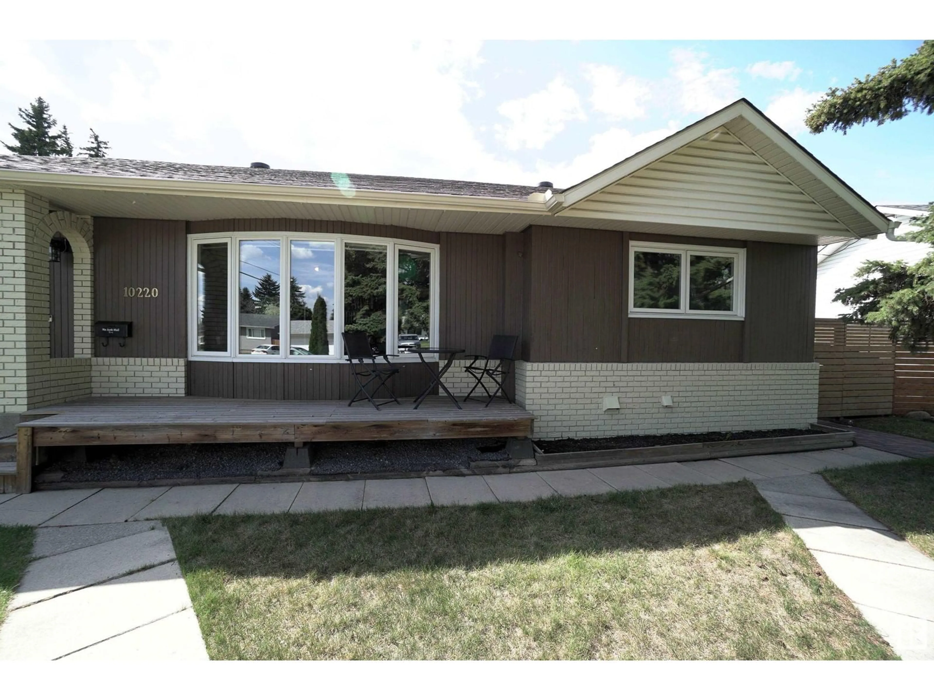 Home with vinyl exterior material, street for NW - 10220 62 ST, Edmonton Alberta T6A2L8
