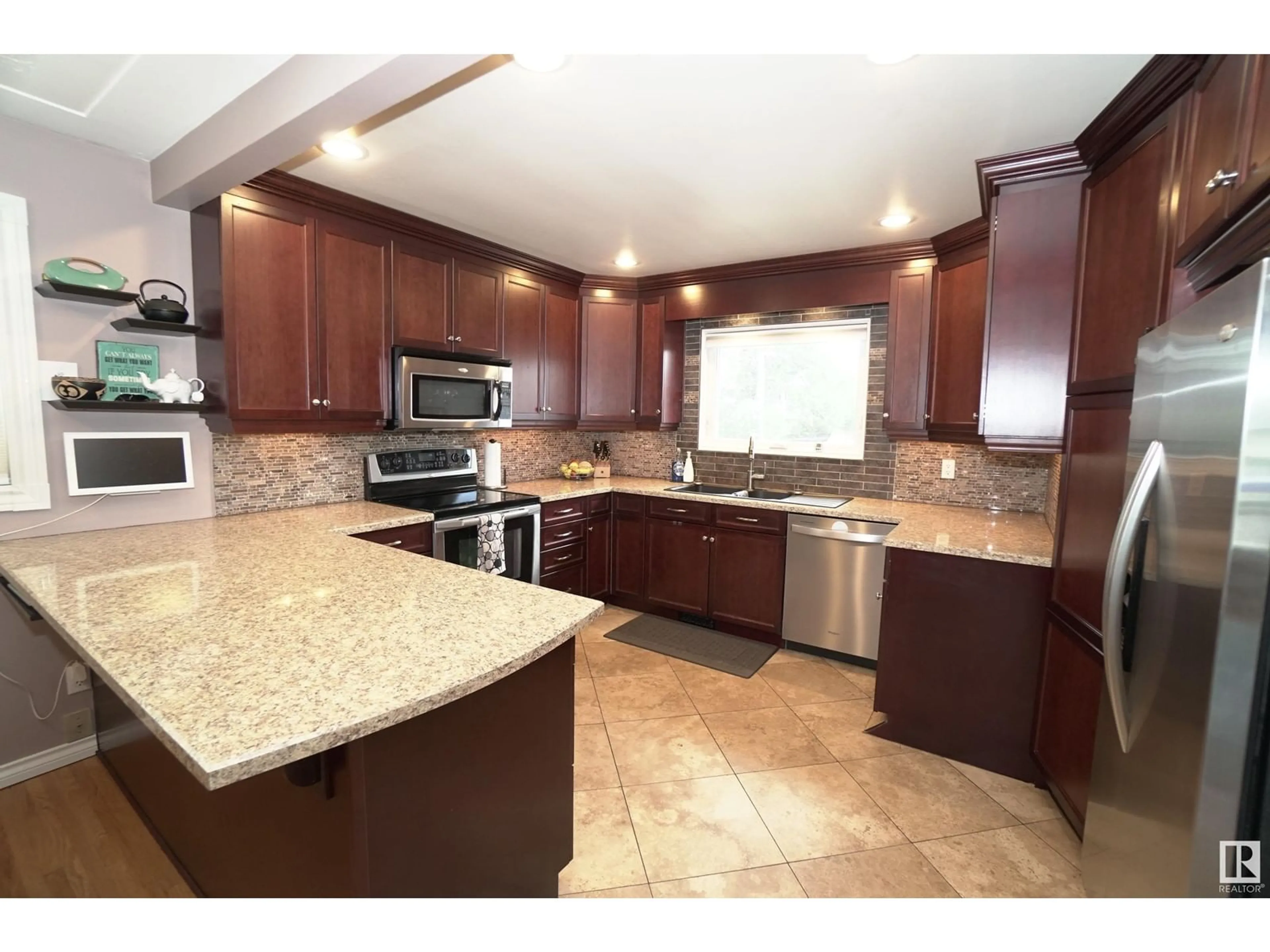 Open concept kitchen, ceramic/tile floor for NW - 10220 62 ST, Edmonton Alberta T6A2L8
