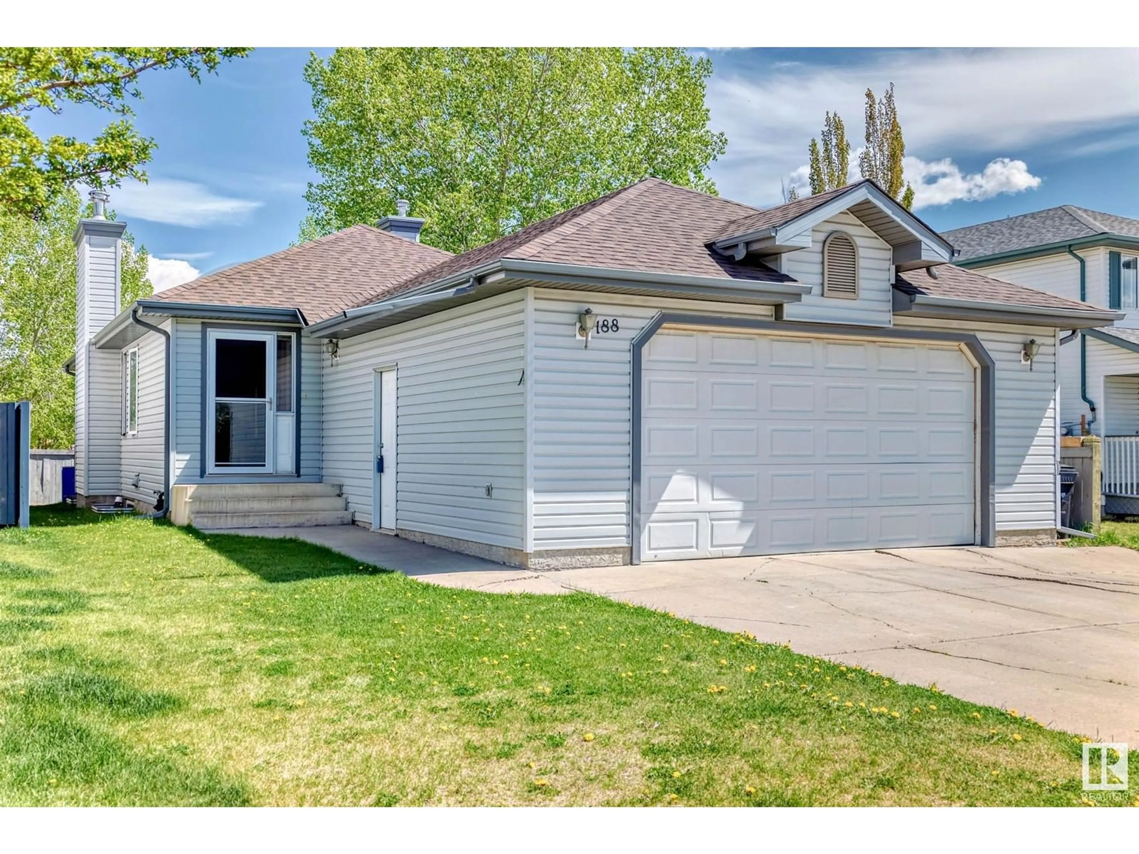 Home with vinyl exterior material, street for 188 LAKELAND DR, Spruce Grove Alberta T7X4B5