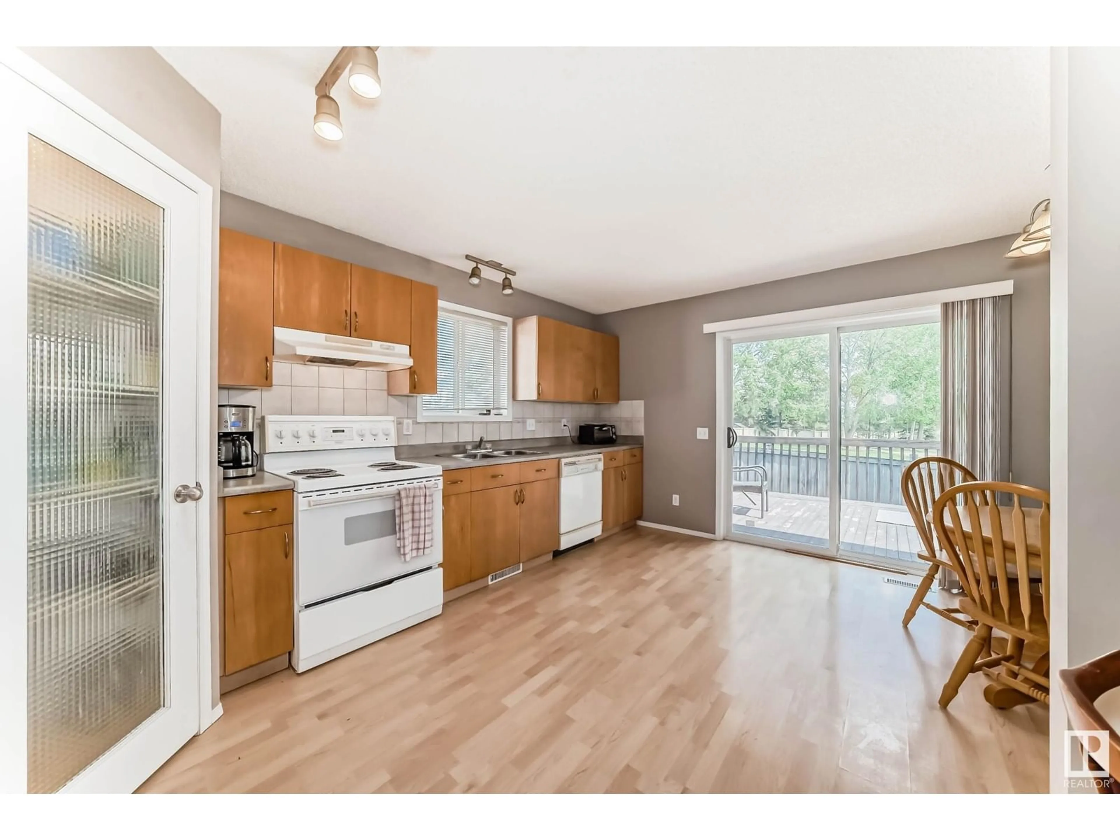 Open concept kitchen, wood/laminate floor for 188 LAKELAND DR, Spruce Grove Alberta T7X4B5